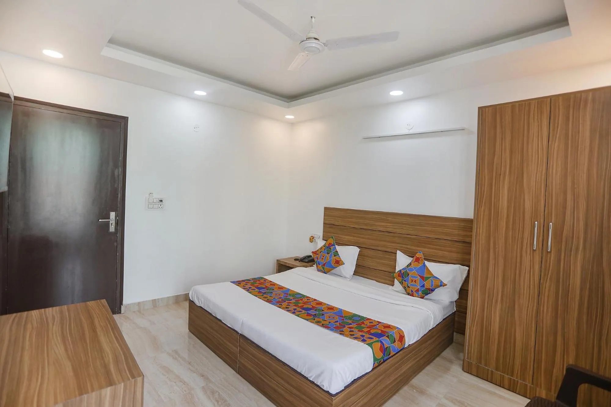 Bed in FabHotel Unique Stay