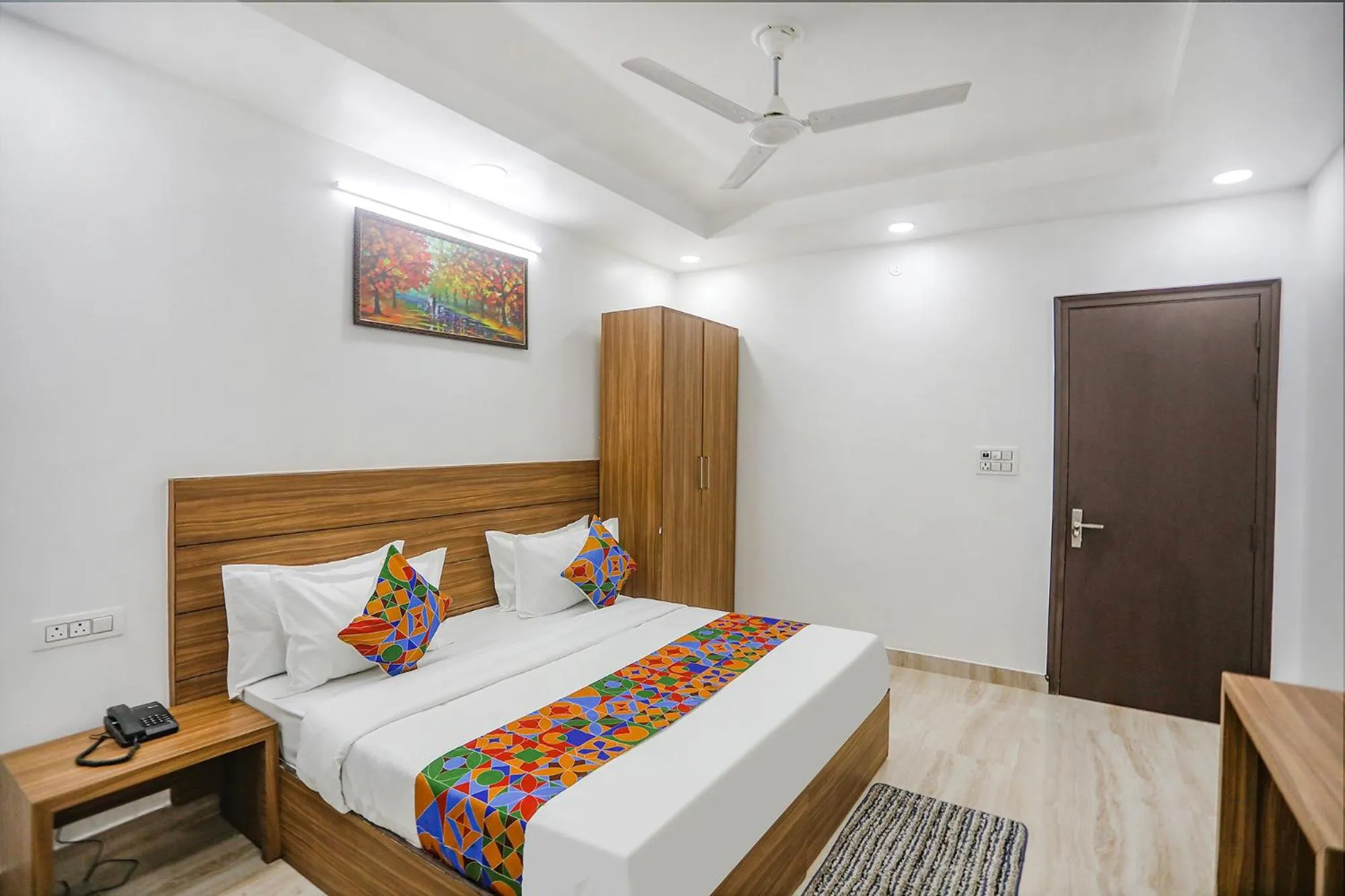 Bed in FabHotel Unique Stay