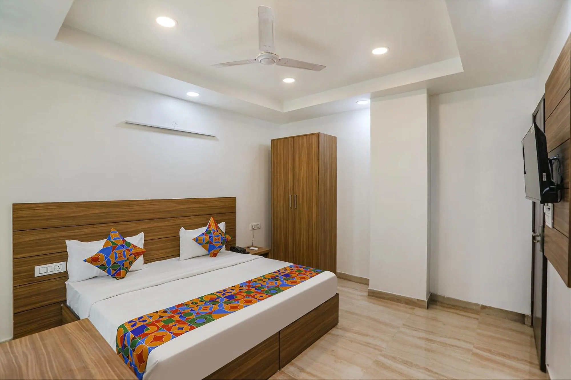 Bed in FabHotel Unique Stay