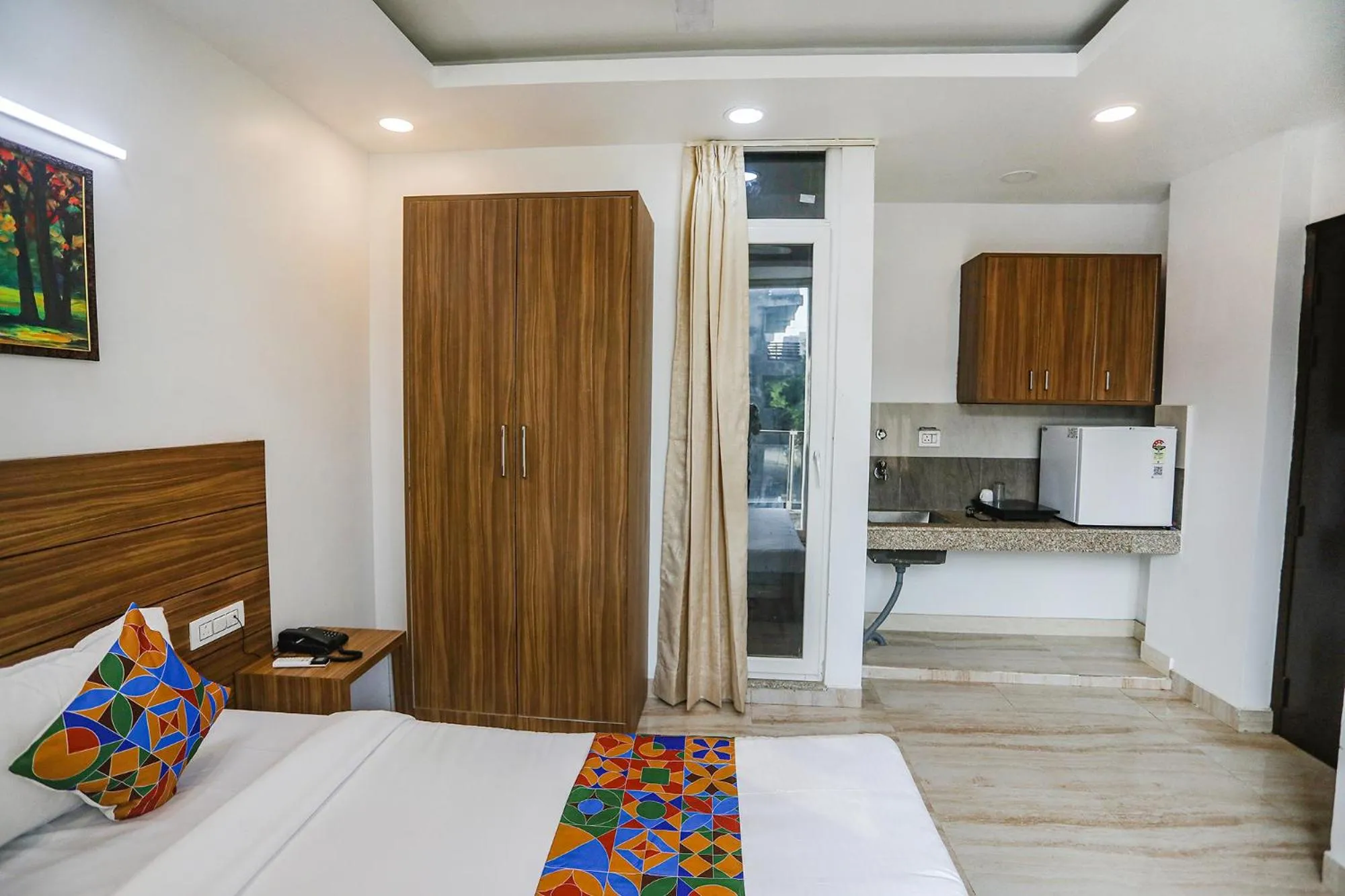 Bed in FabHotel Unique Stay