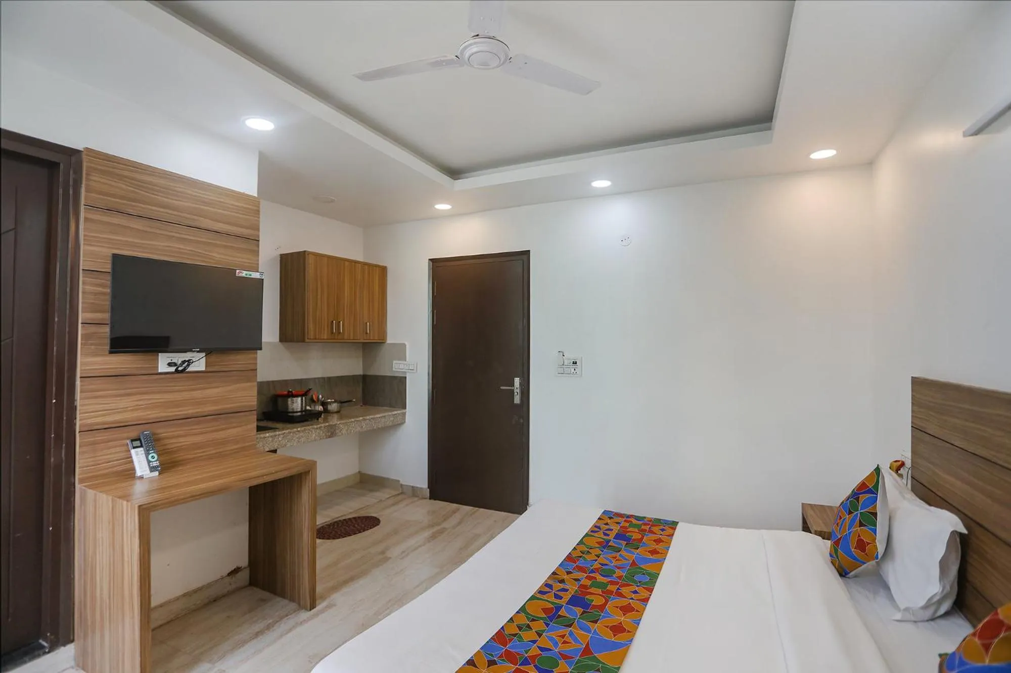 Bed in FabHotel Unique Stay