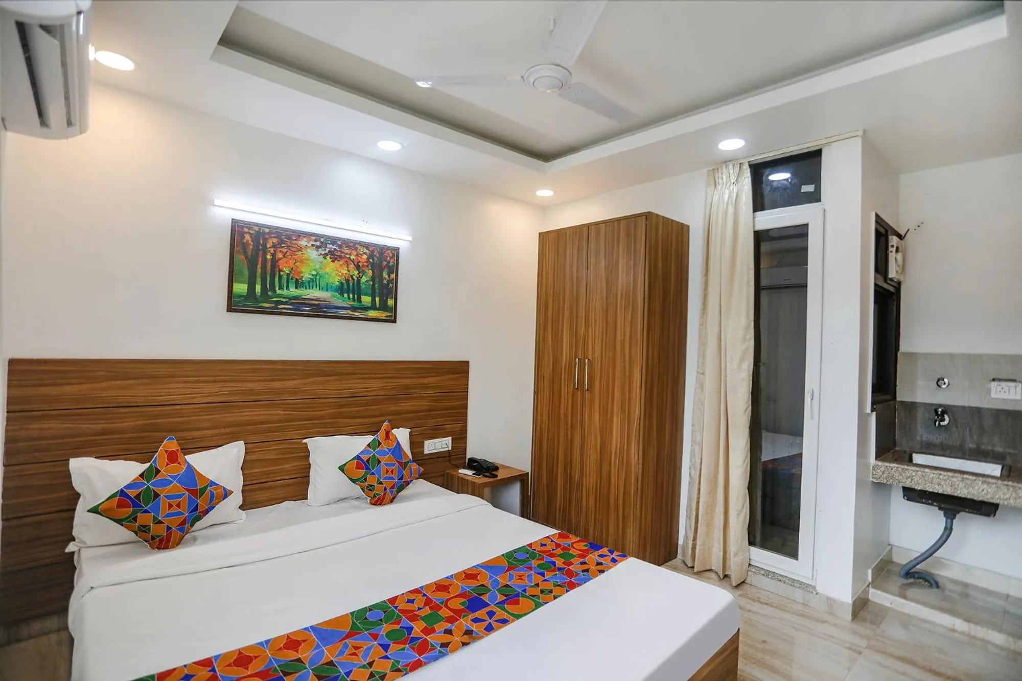 Bed in FabHotel Unique Stay