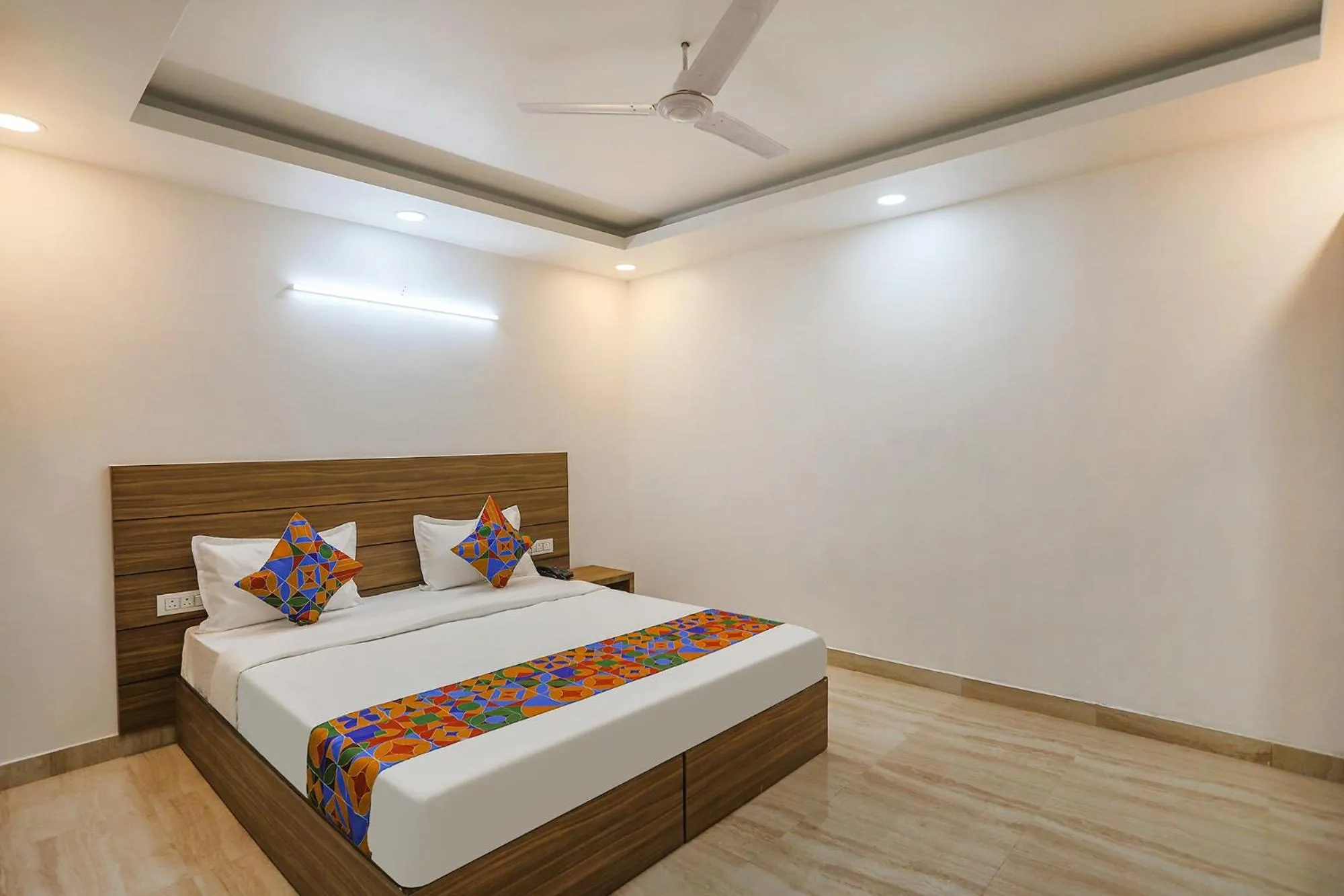 Bed in FabHotel Unique Stay