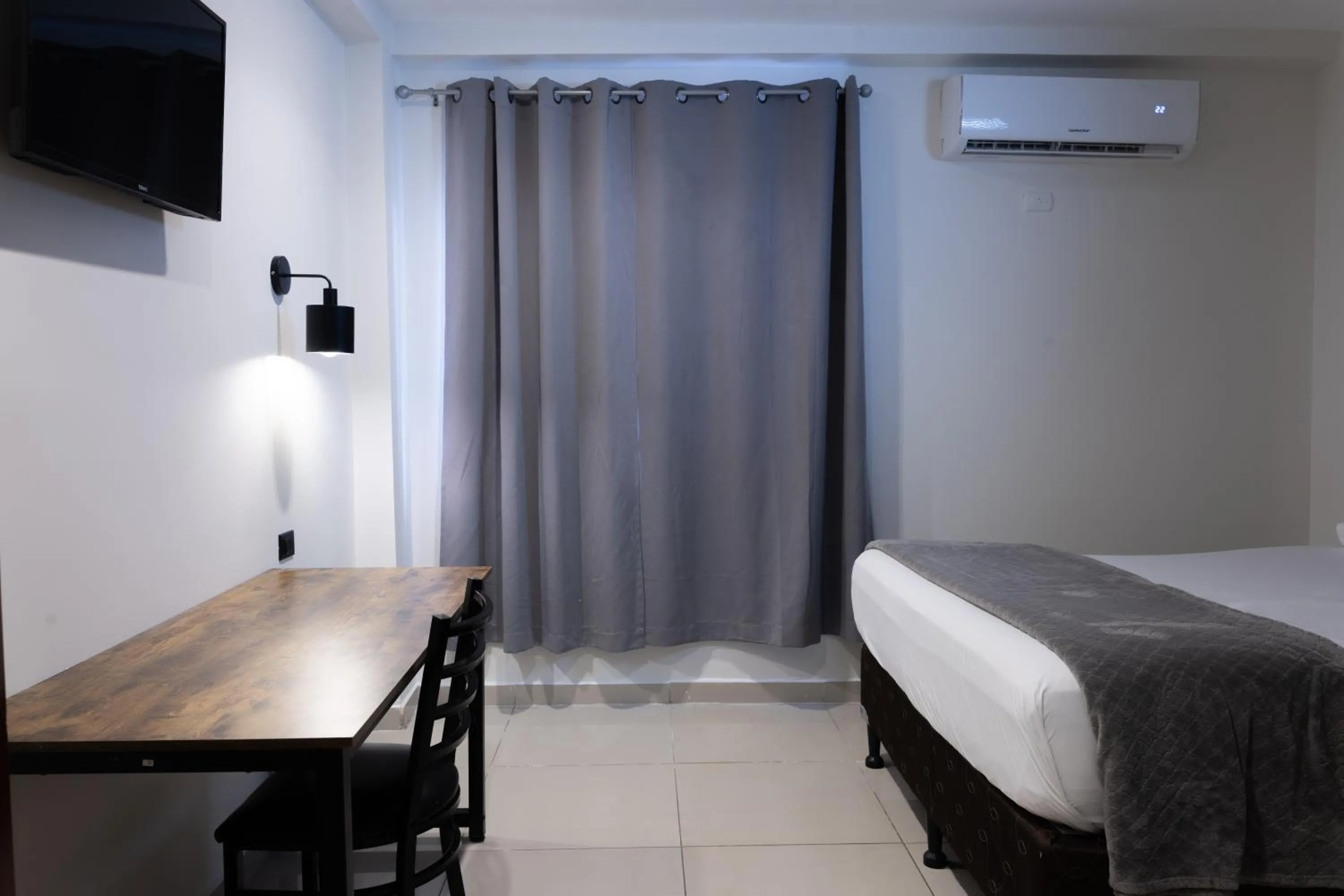 Bed in Micro Hotel Rio de Piedras