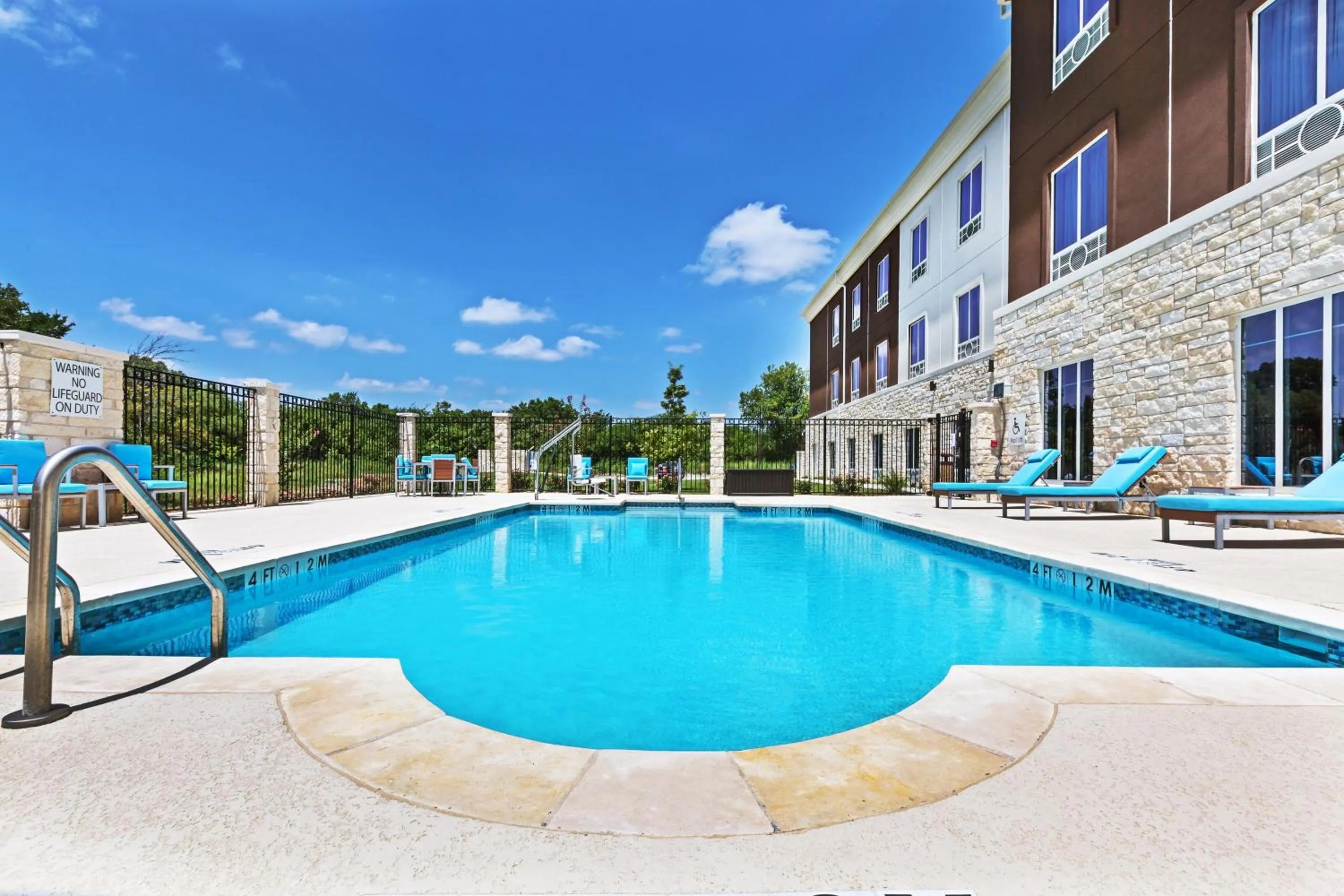 Swimming pool in Holiday Inn Express and Suites Killeen-Fort Hood Area by IHG