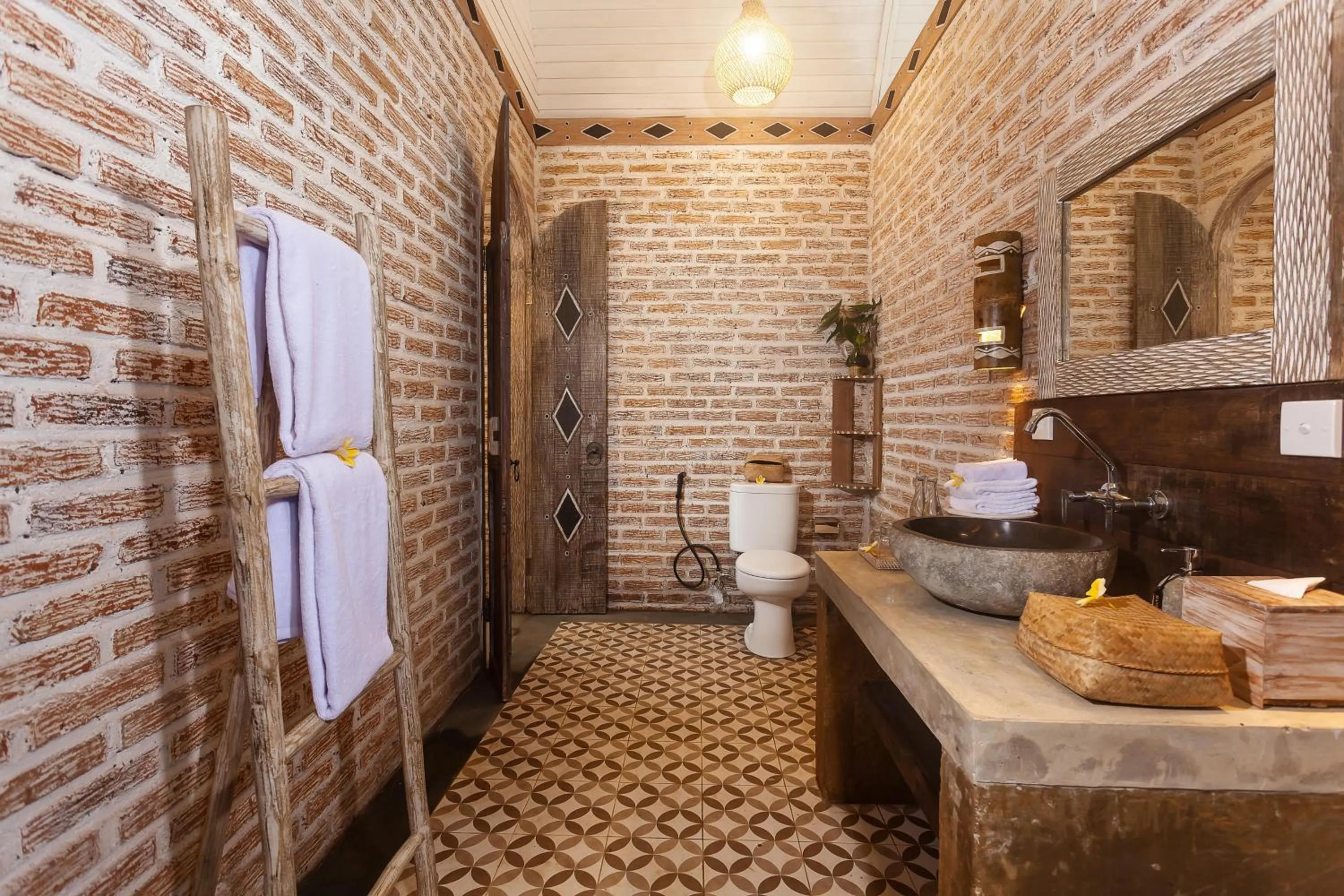 Bathroom in Sacred Canyon Ubud by GenuineHost