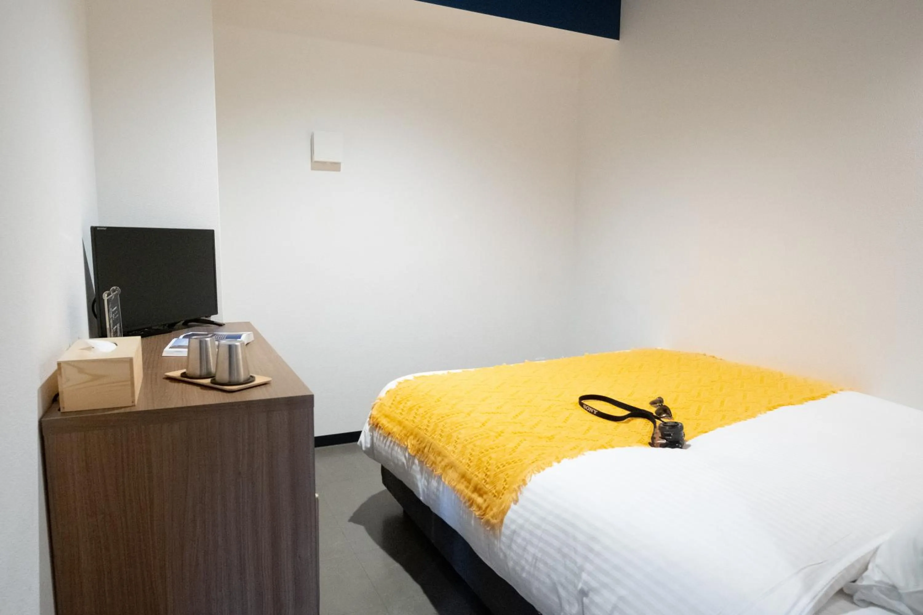 Bed in WAYFARER Shinsaibashi