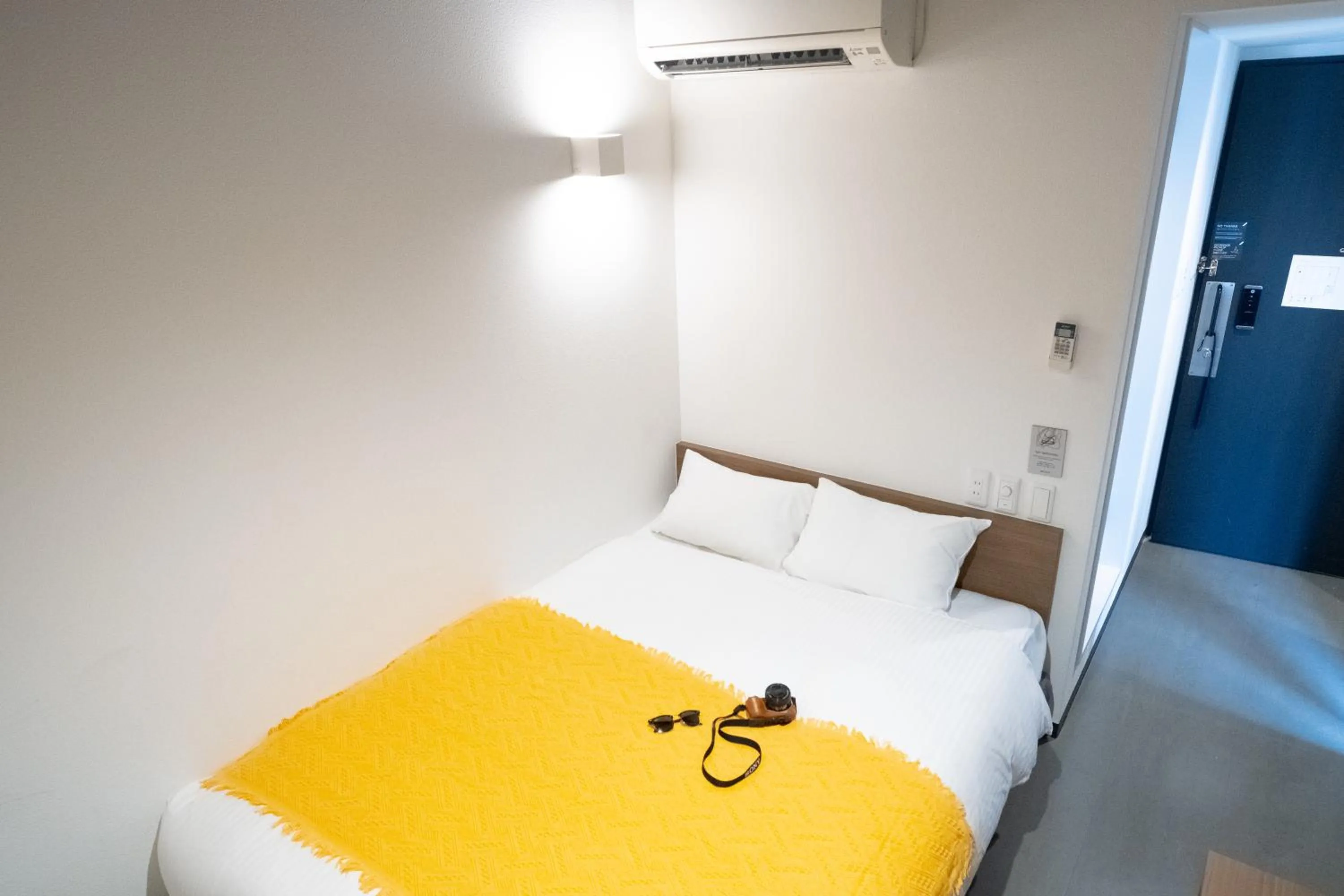Bed in WAYFARER Shinsaibashi