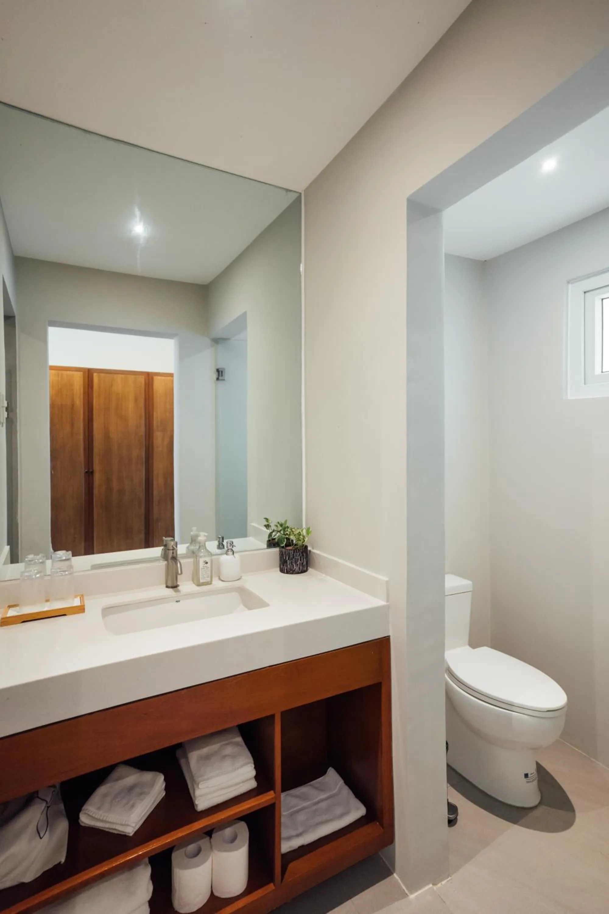 Toilet in Solitude Acacia Resort