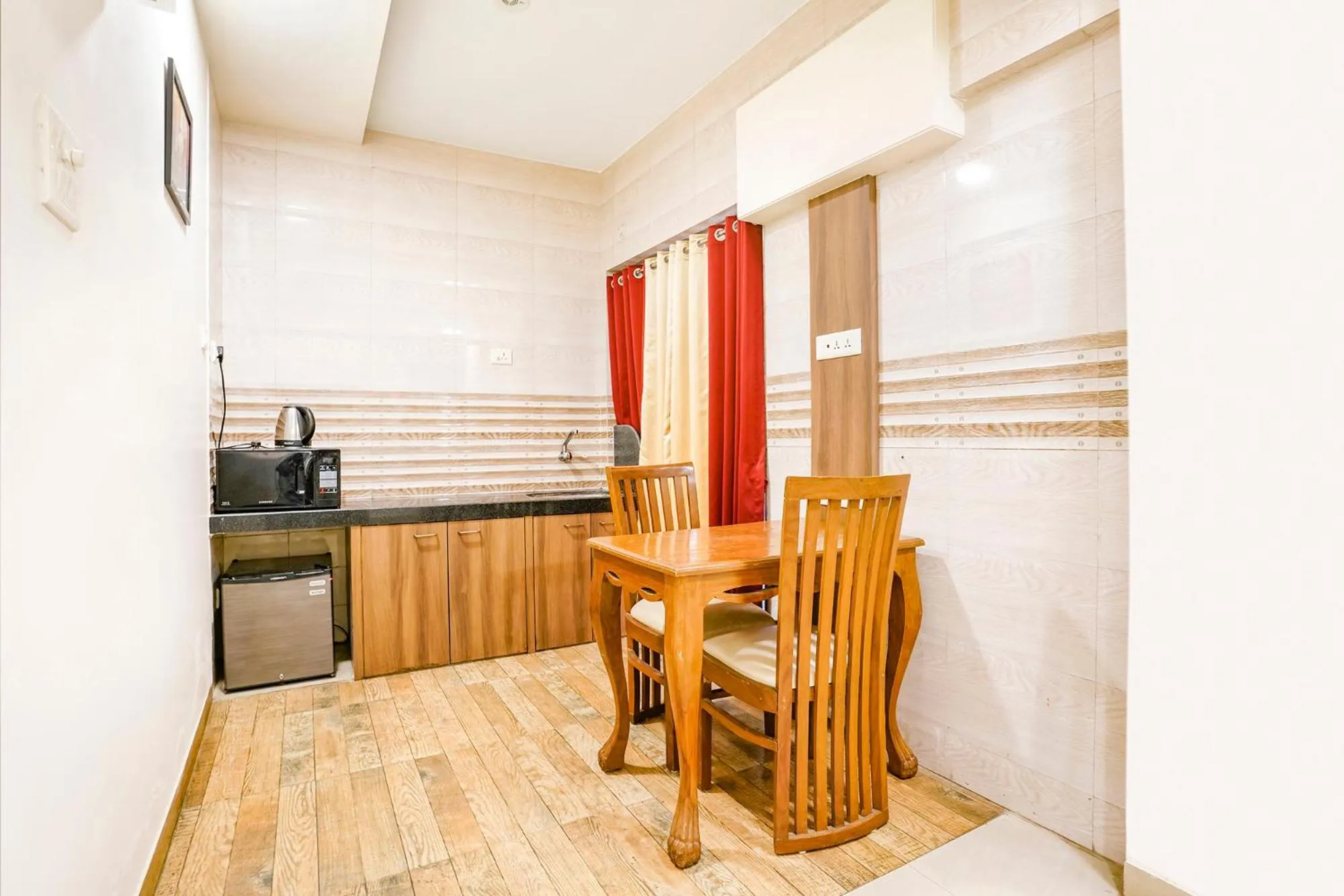 Kitchen or kitchenette in Hotel Candor Amigo Kamothe Panvel