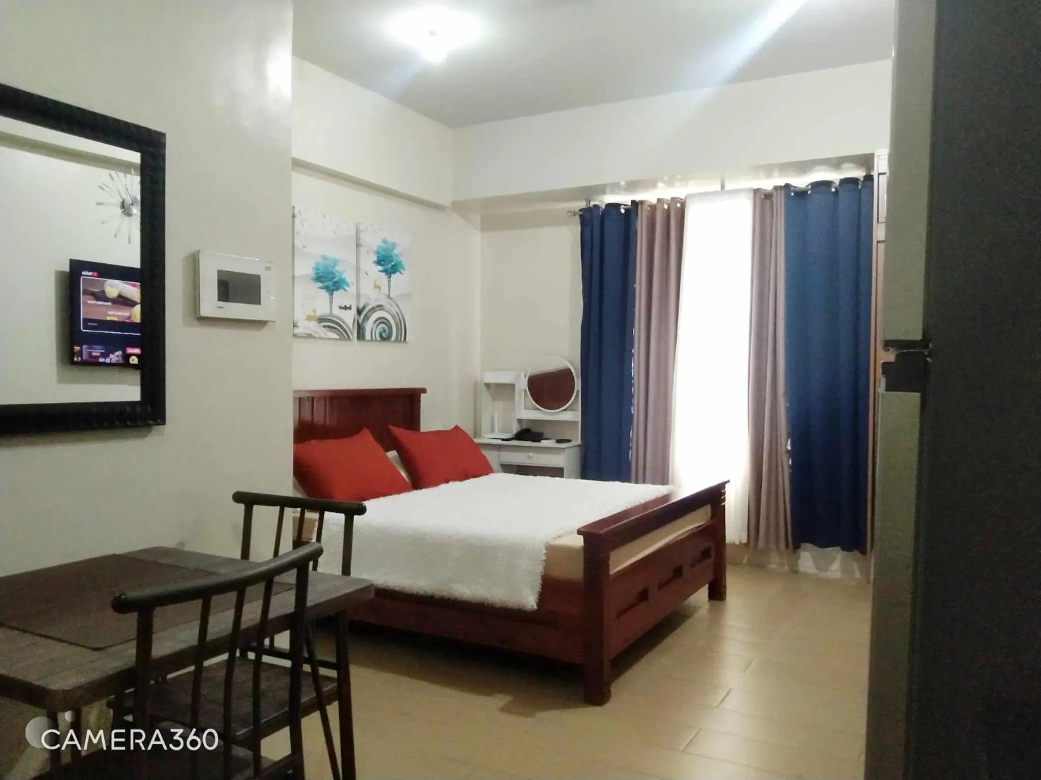 Photo of the whole room, Bed in Pasay Condotel near NAIA terminal 3 (3 mins walk in)