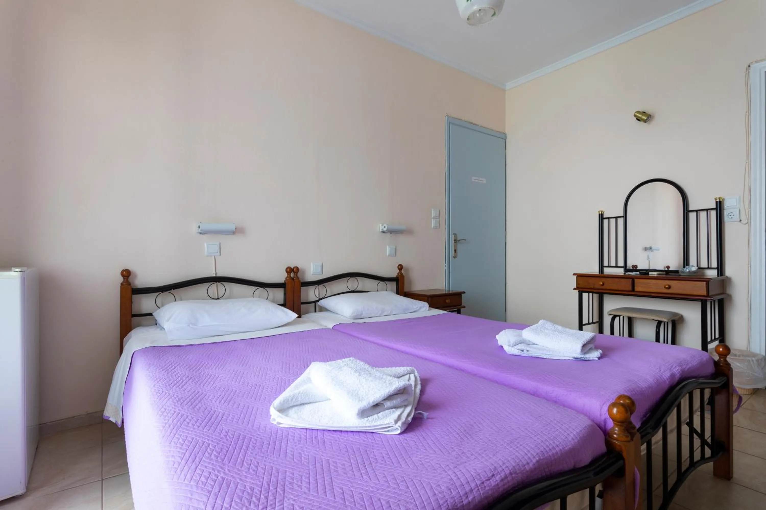 Bed in Stelios Hotel