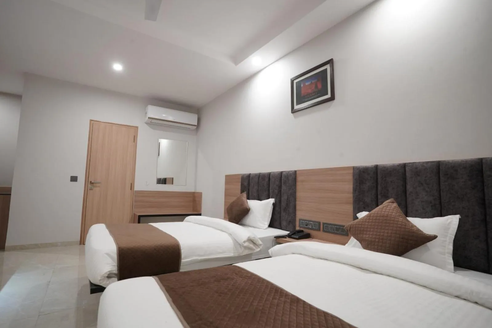 Photo of the whole room, Bed in Hotel Krishna Inn