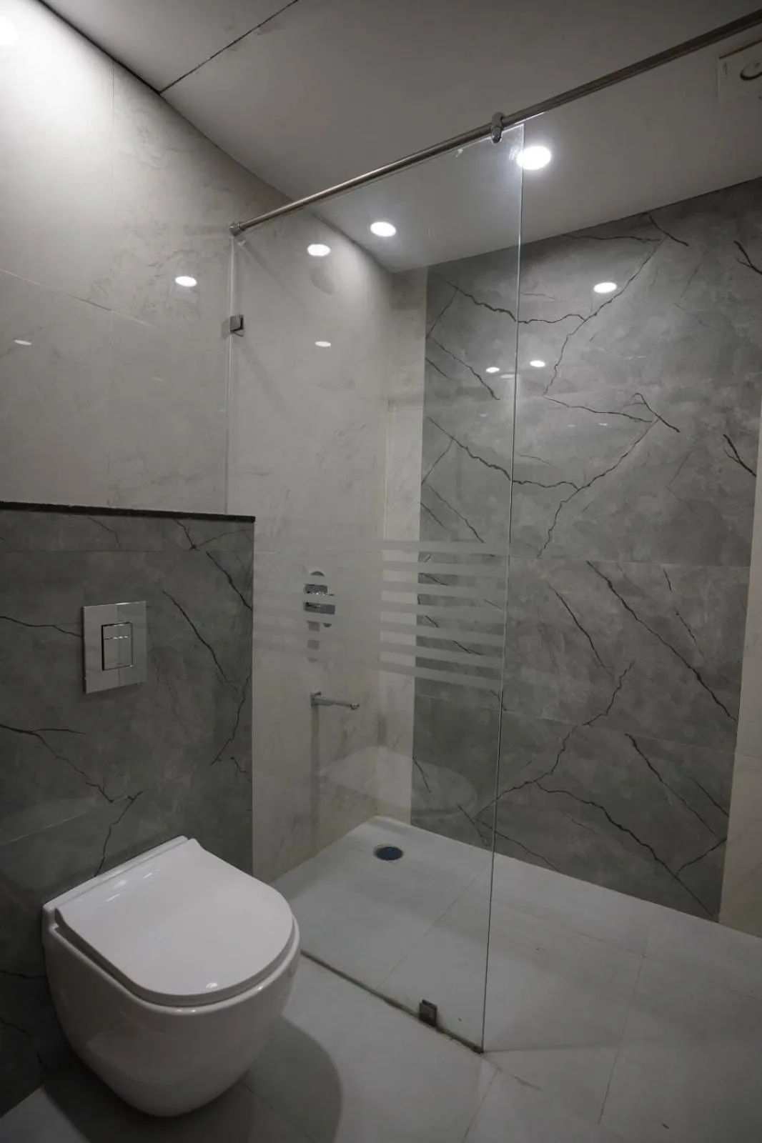 Shower in Hotel Krishna Inn