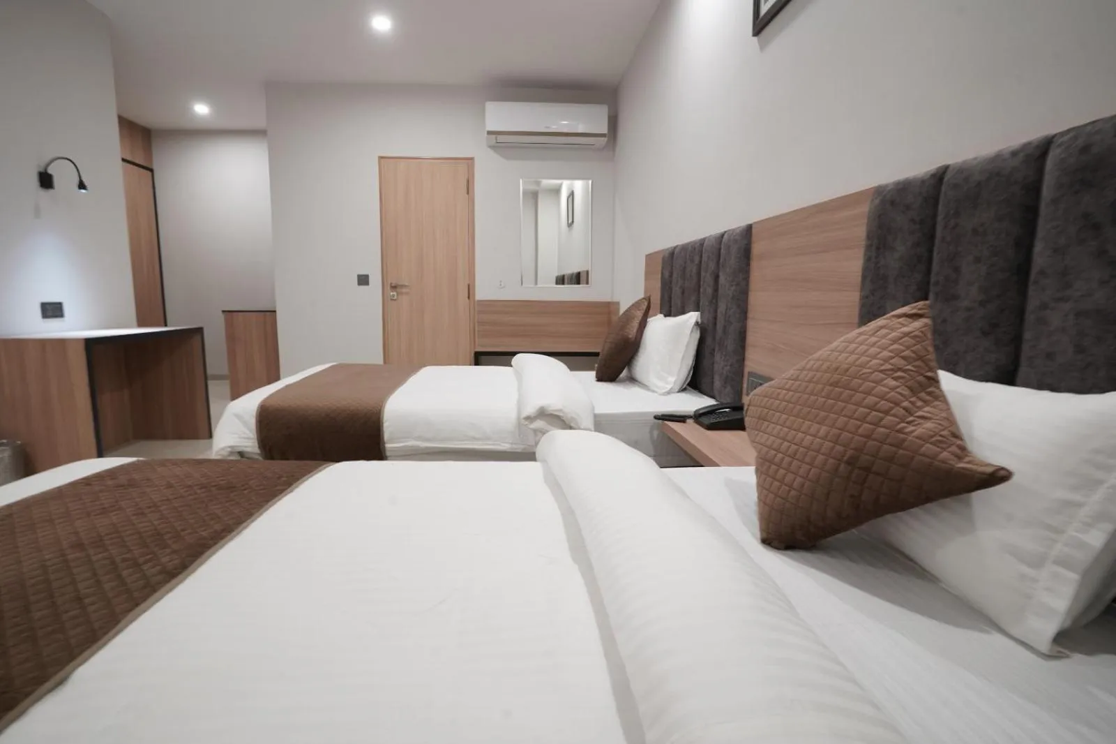 Bed in Hotel Krishna Inn