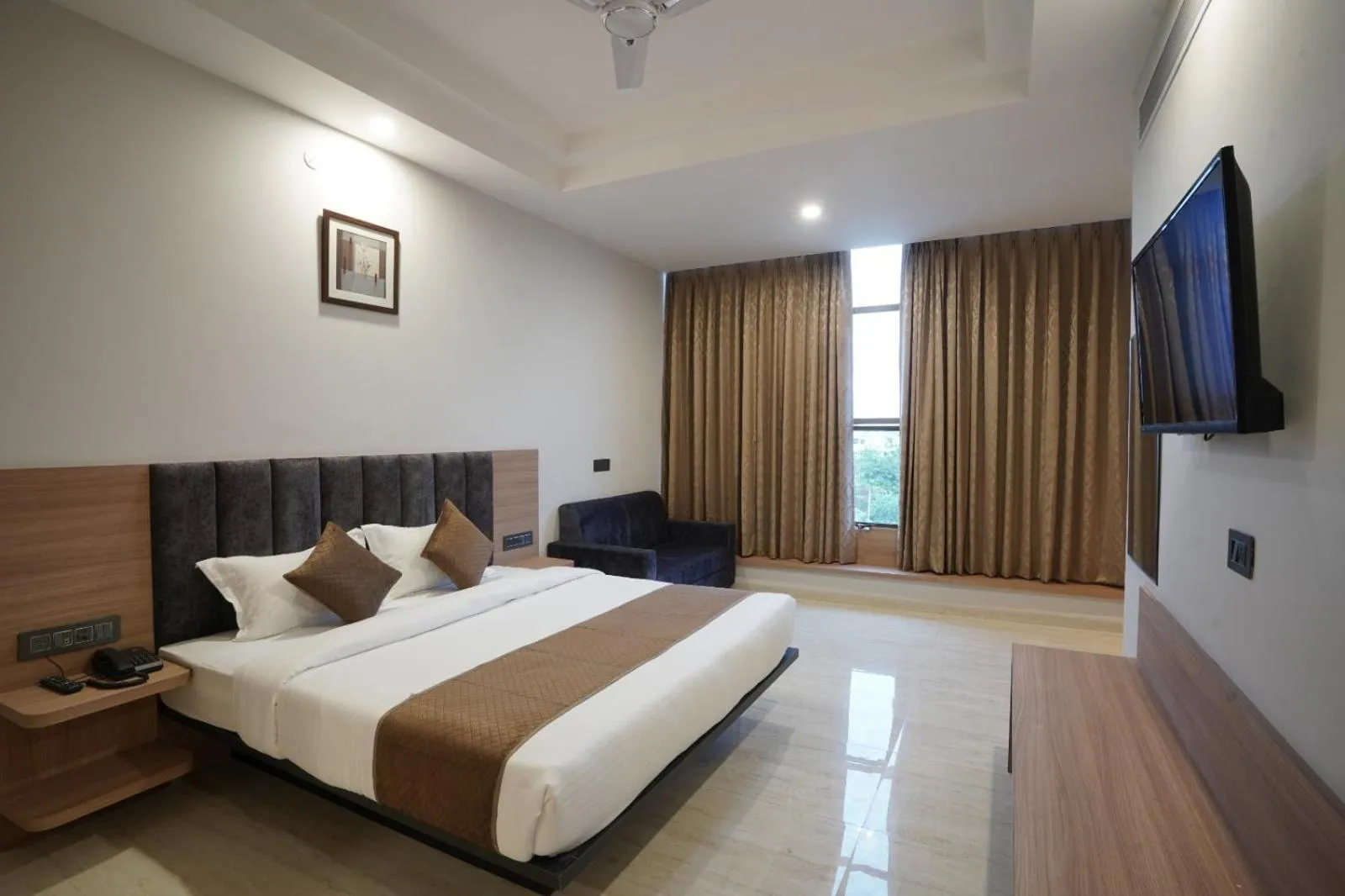 Photo of the whole room, Bed in Hotel Krishna Inn