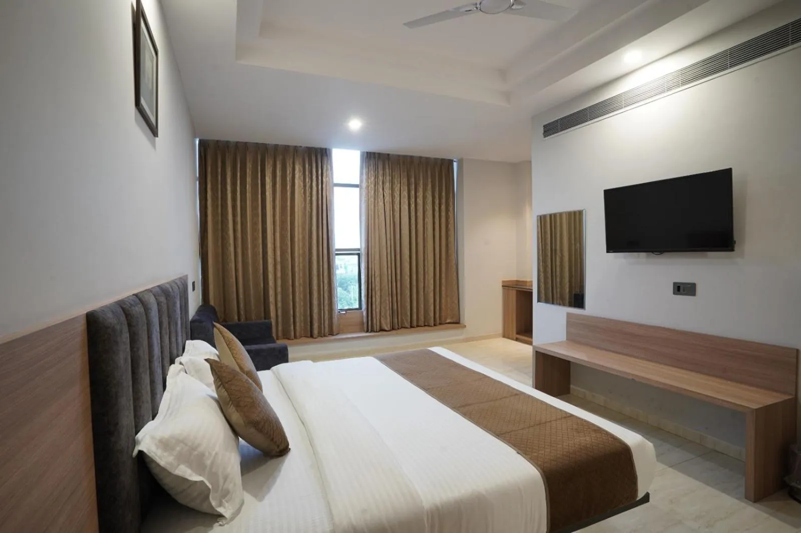 Photo of the whole room, Bed in Hotel Krishna Inn