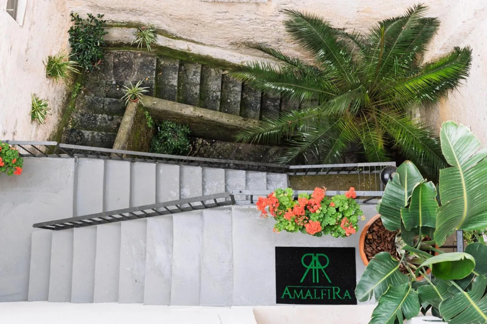 Property logo or sign in AmalfiRa Luxury Seaview Rooftop