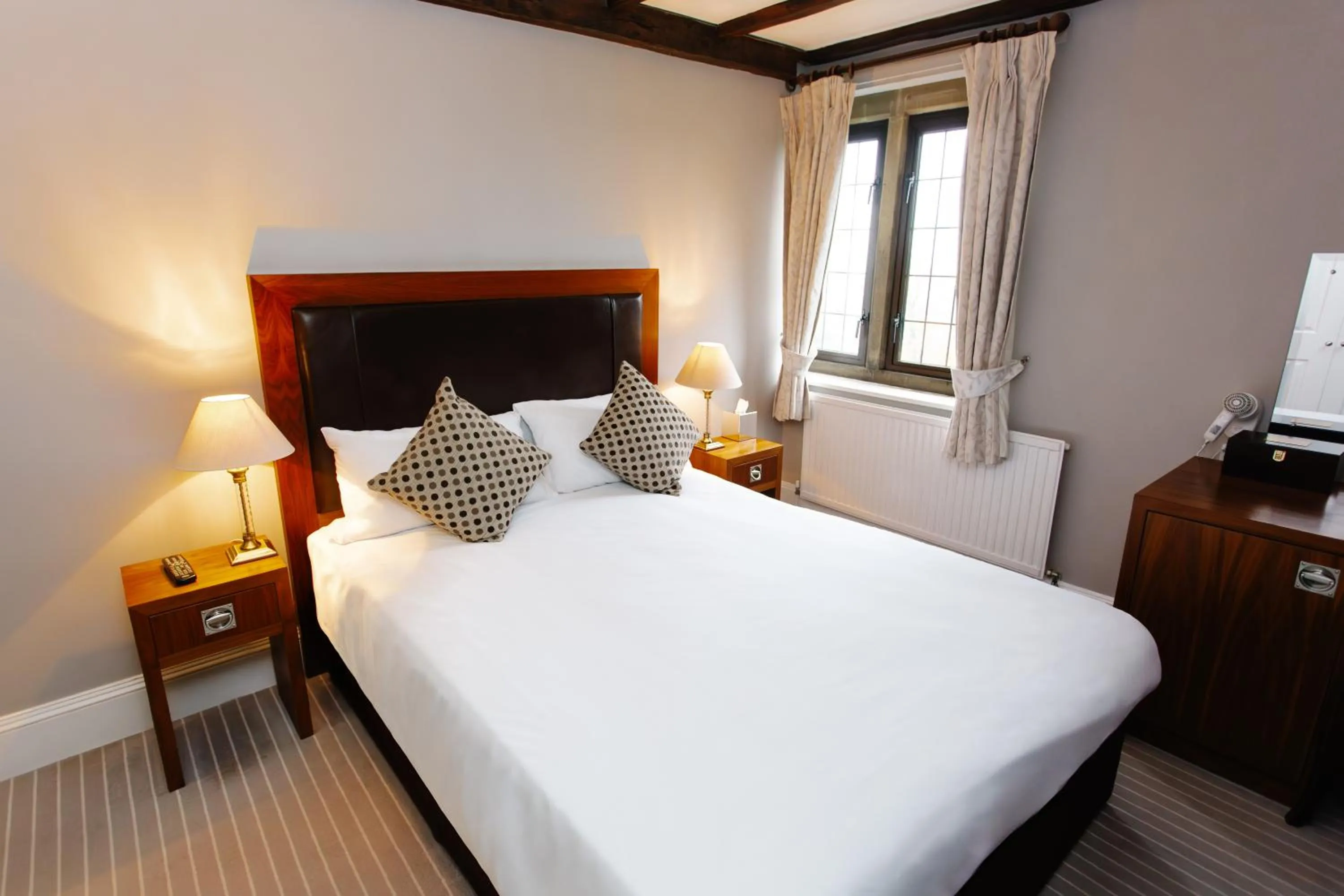 Bed in Hatton Court Hotel