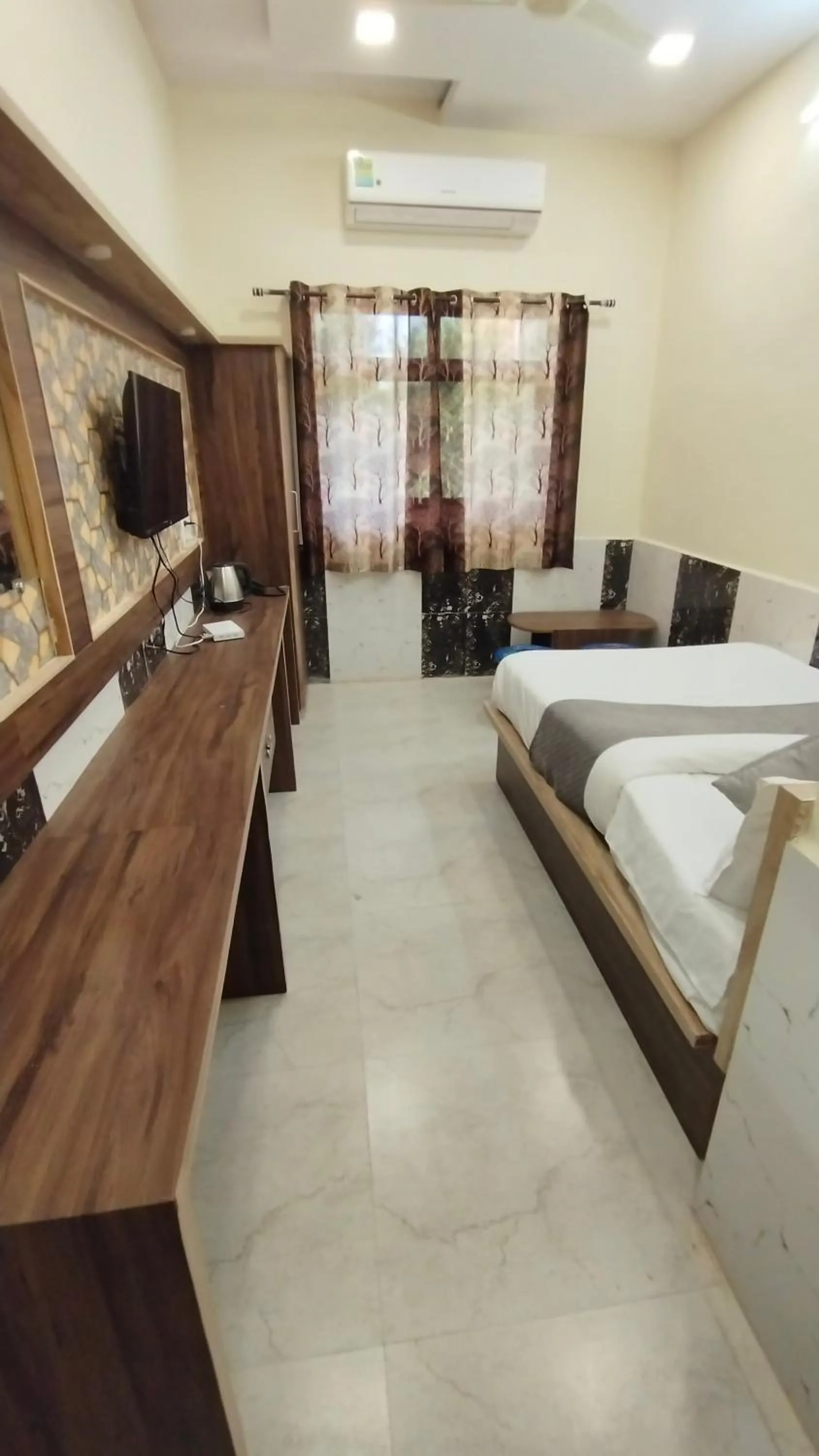 Bed in Hotel Grand Vijay