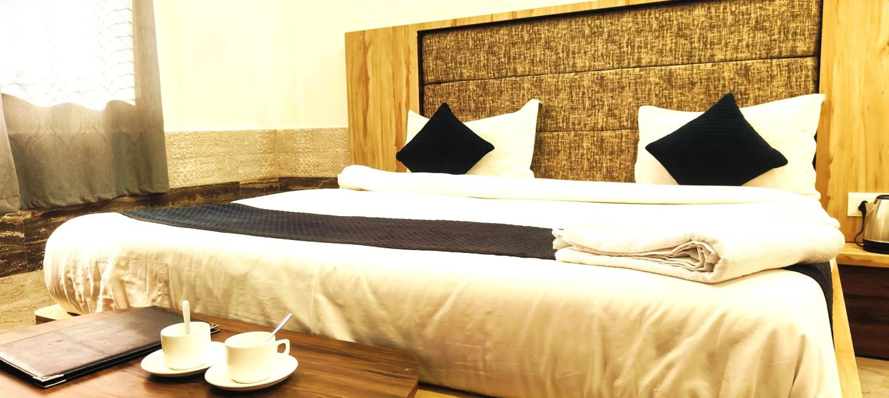 Bedroom in Hotel Grand Vijay