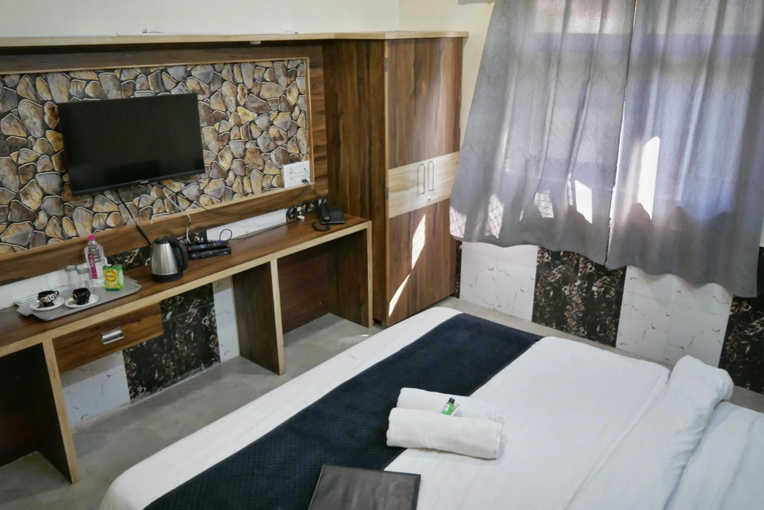 Bed in Hotel Grand Vijay