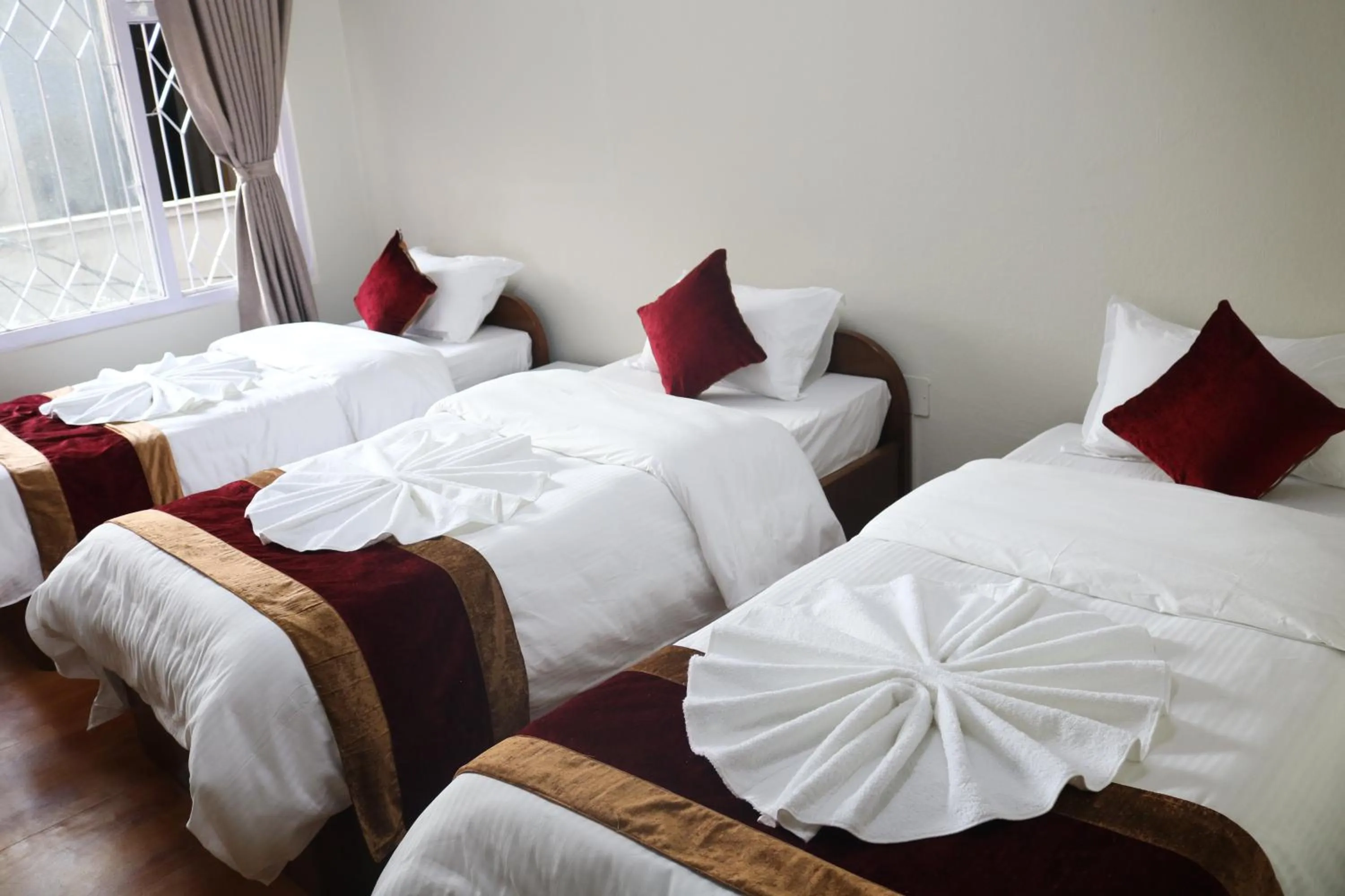 Bed in Om Tara Guest House Pvt Ltd