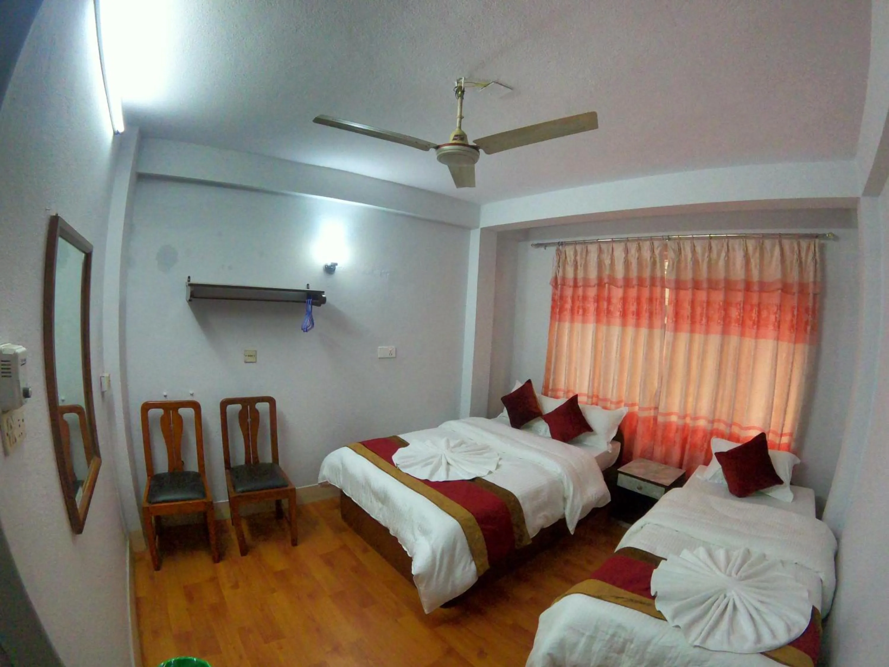 Bedroom, Bed in Om Tara Guest House Pvt Ltd