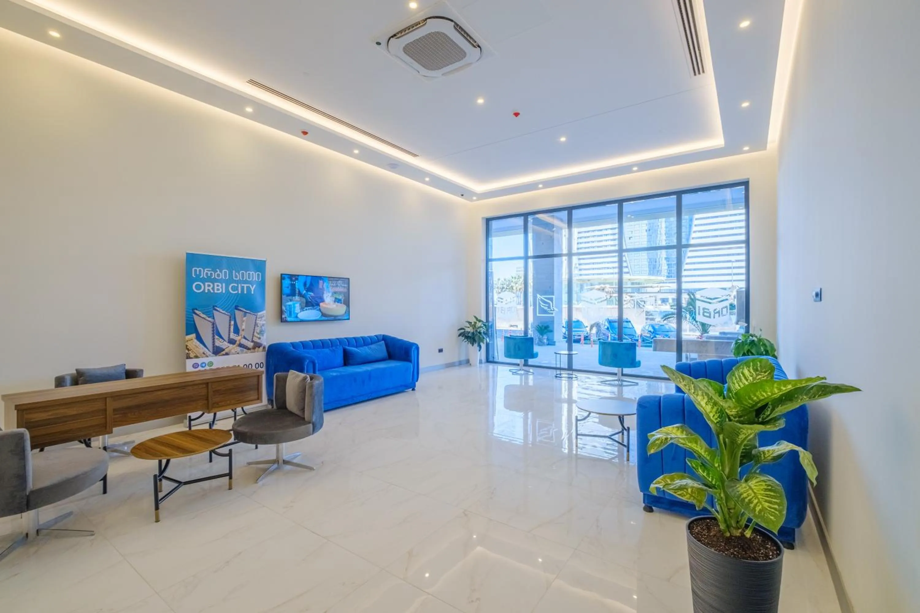Lobby or reception in Orbi City Hotel Official D Block