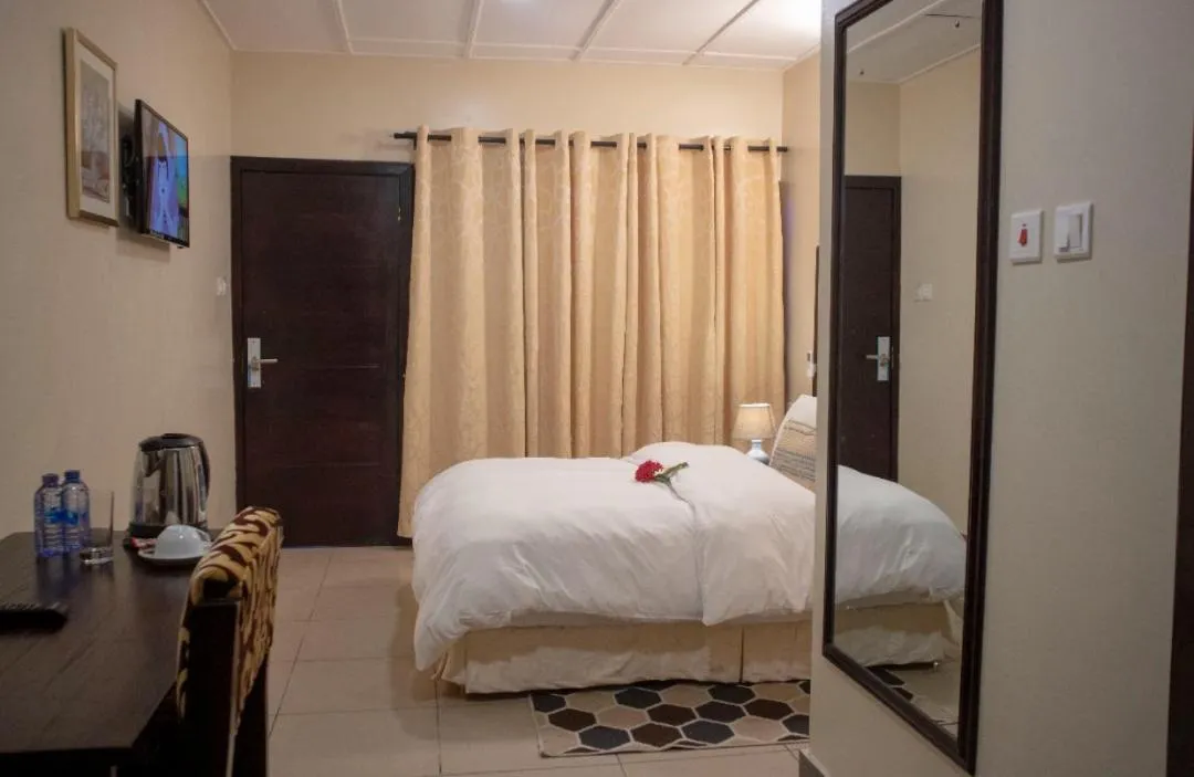 Bed in SSNIT GUEST HOUSE
