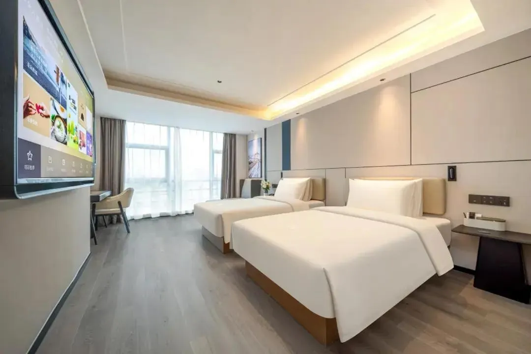 Bed in Atour X Hotel Hangzhou Wenyi Road