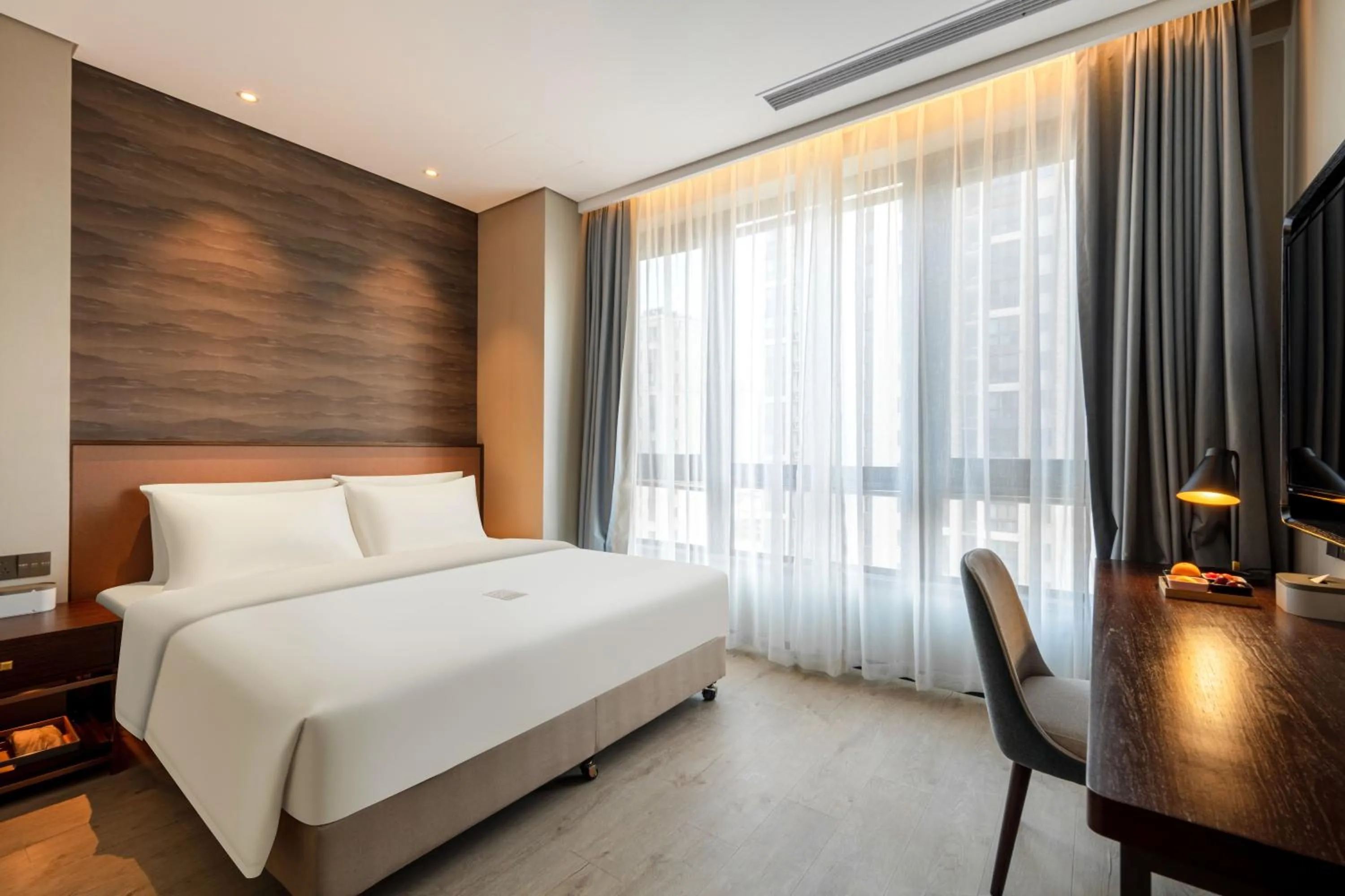 Bed in Atour X Hotel Suzhou Xiangcheng Vigorous Island Subway Station