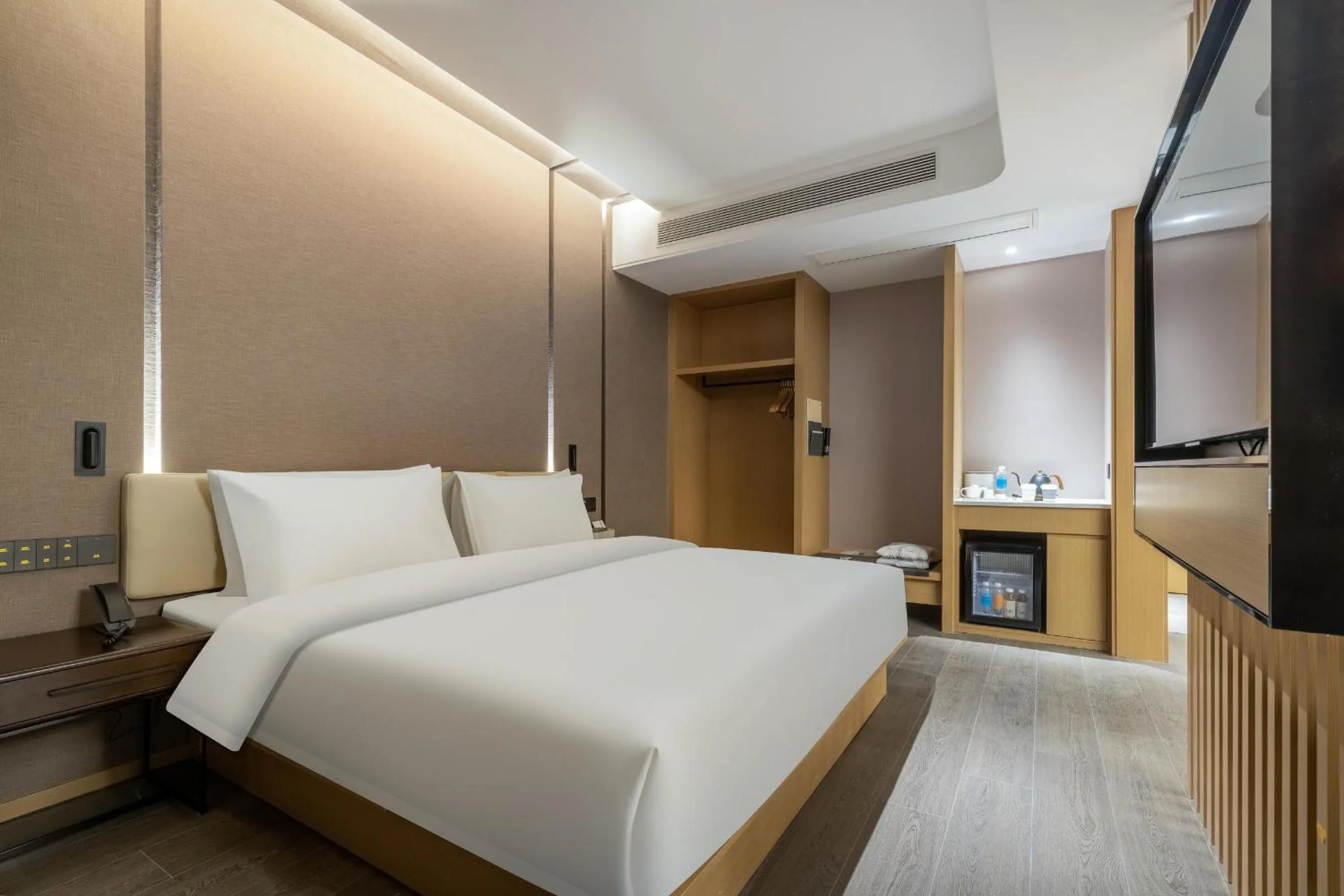 Bed in Atour Hotel Xinghua Dainan