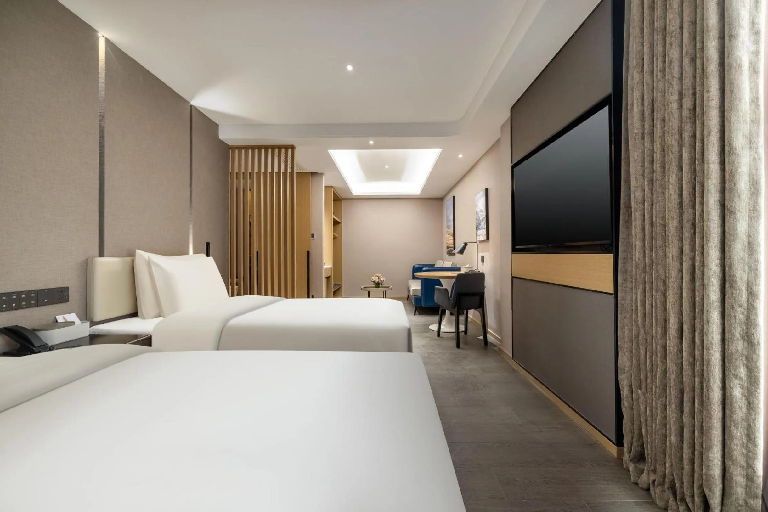 Bed in Atour Hotel Xinghua Dainan