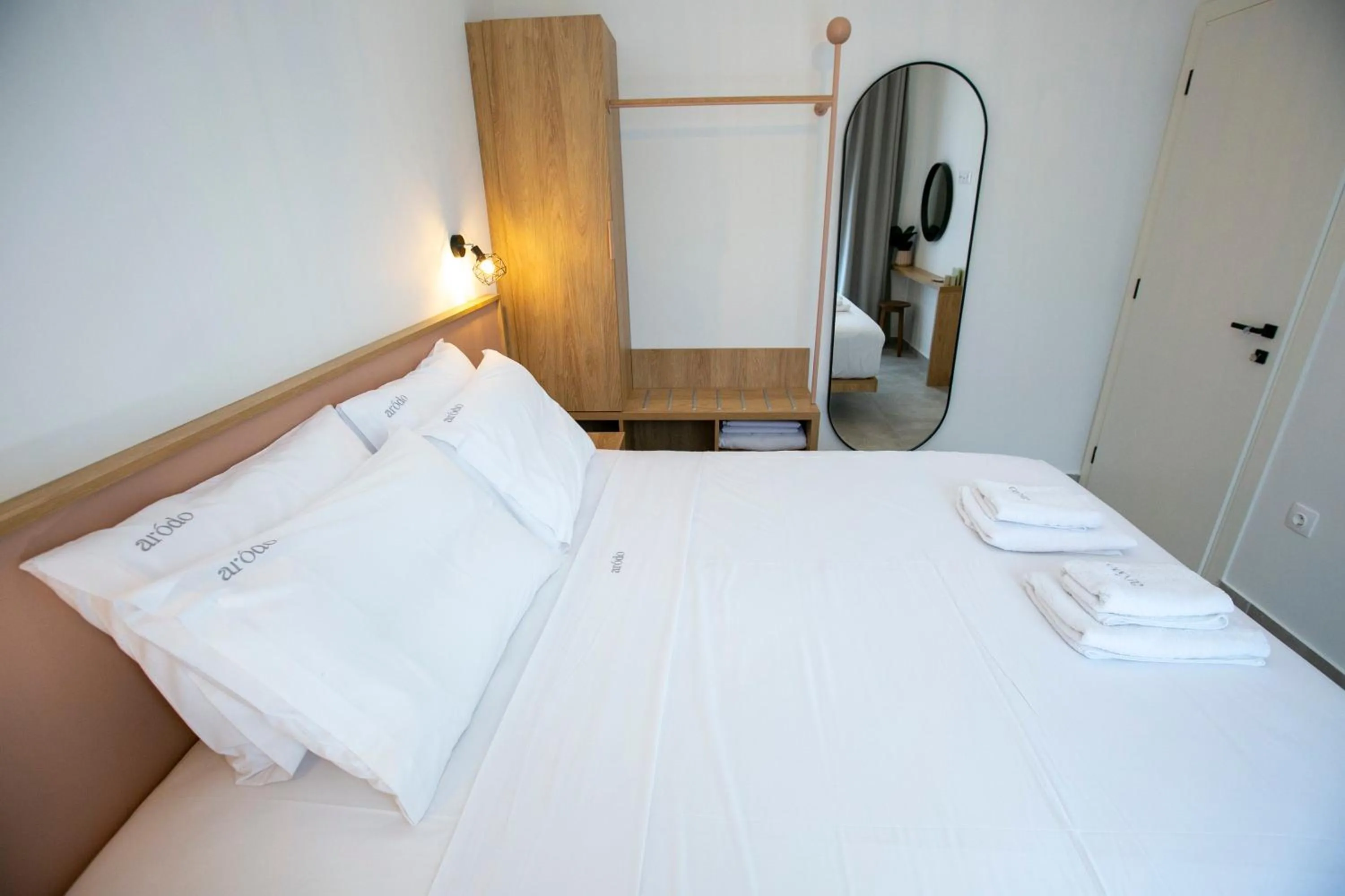 Bed in Arodo Suites