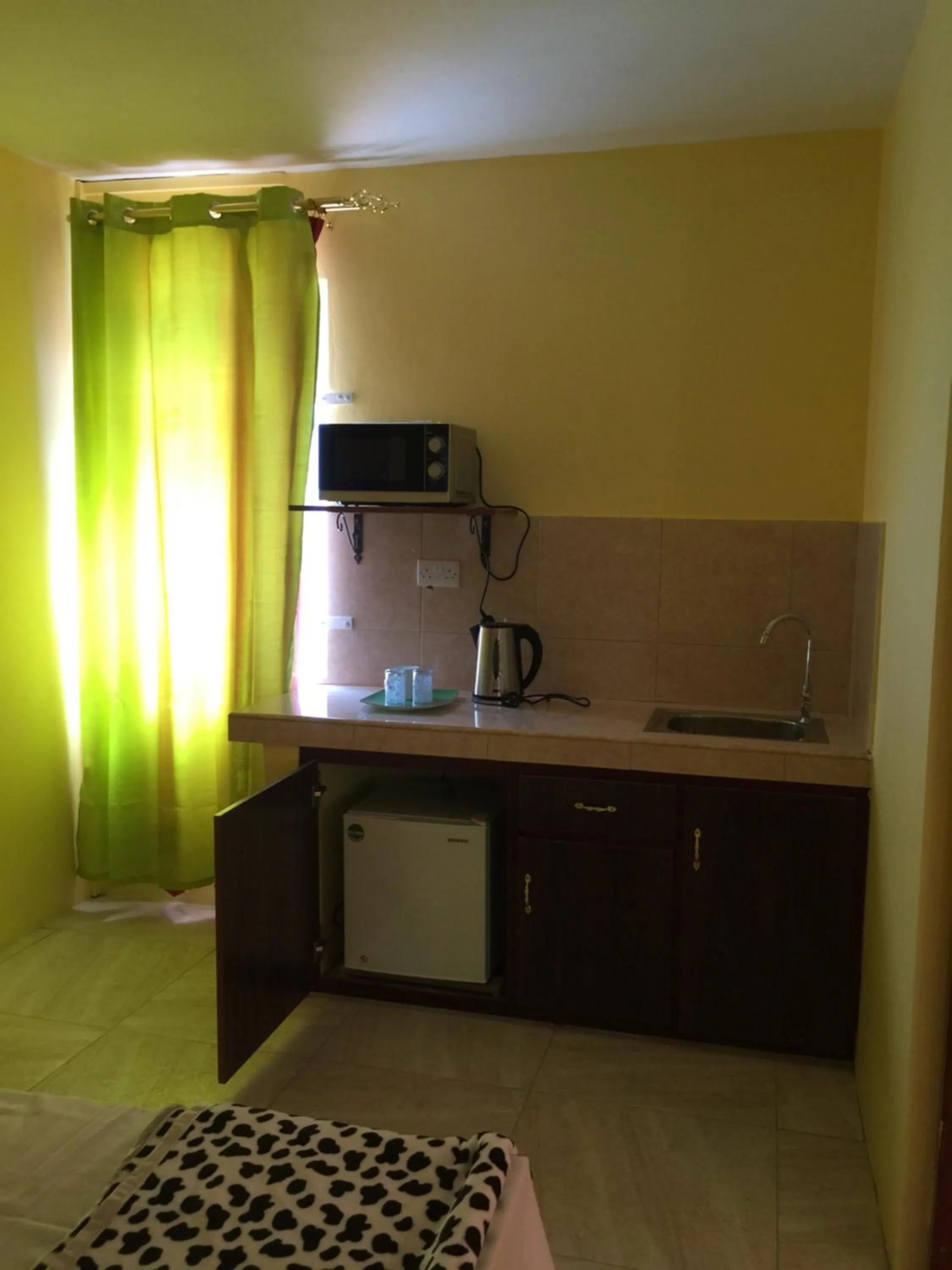 Kitchen or kitchenette in Bob Apartments