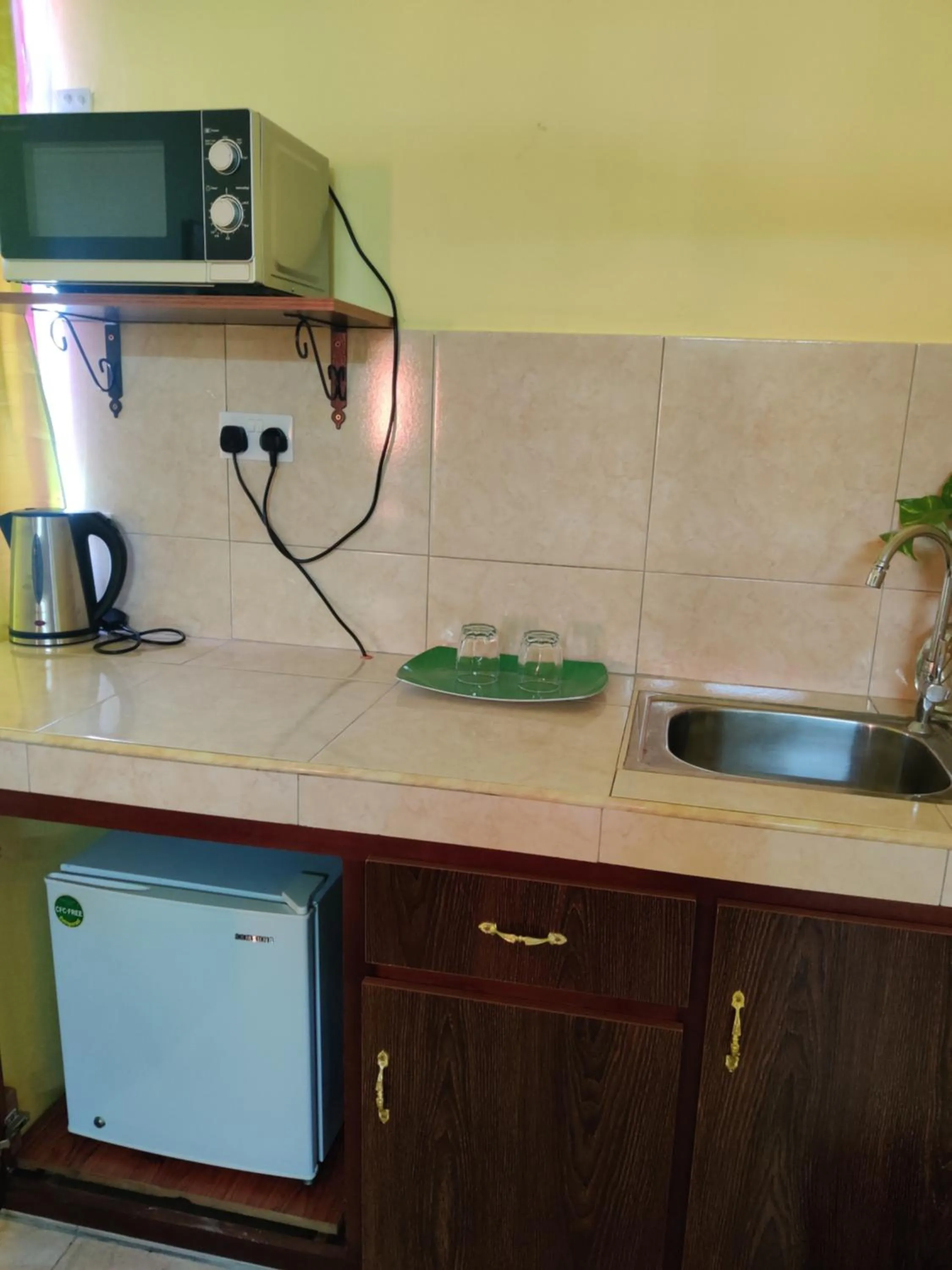 Kitchen or kitchenette in Bob Apartments