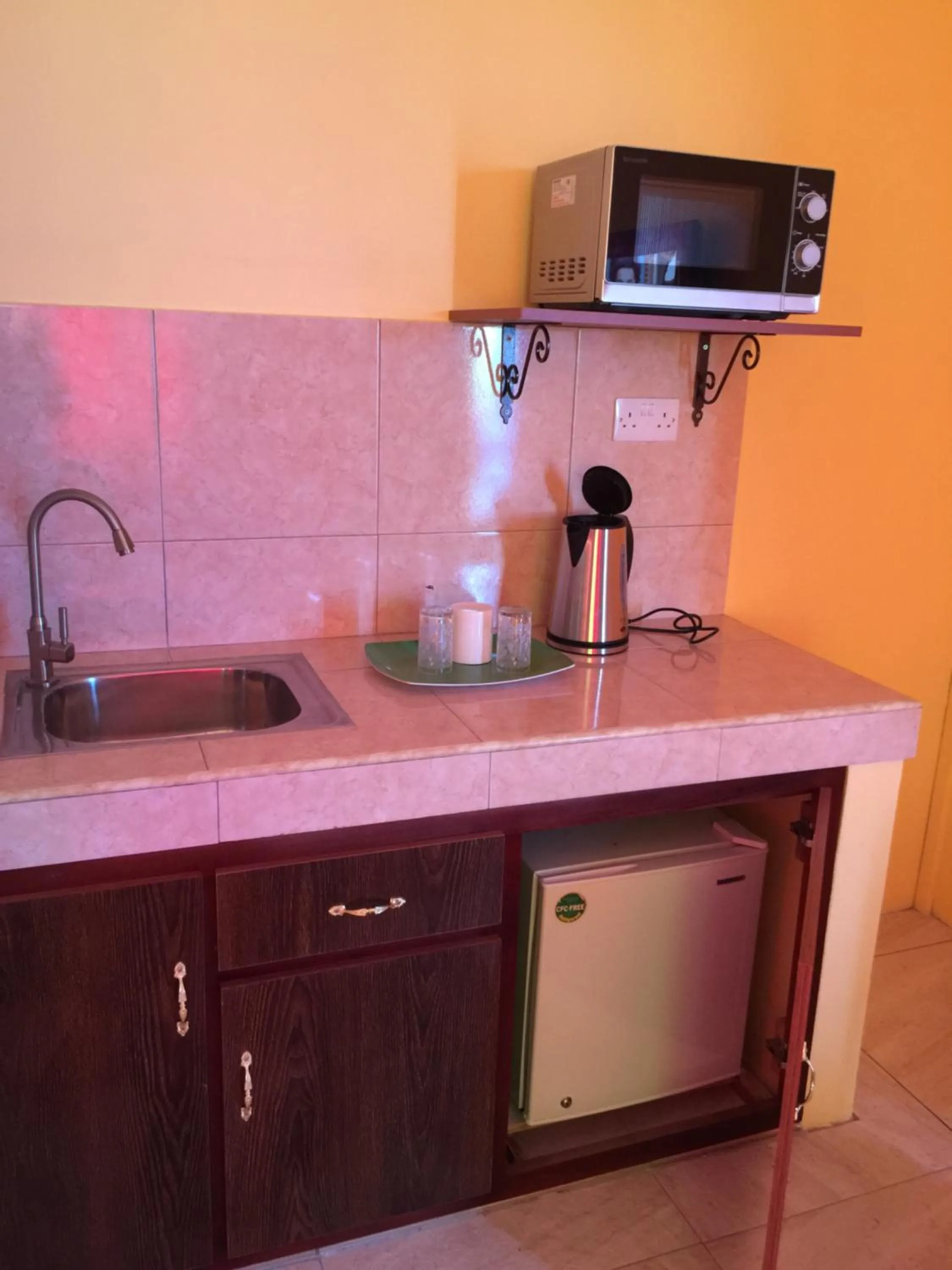 Kitchen or kitchenette in Bob Apartments