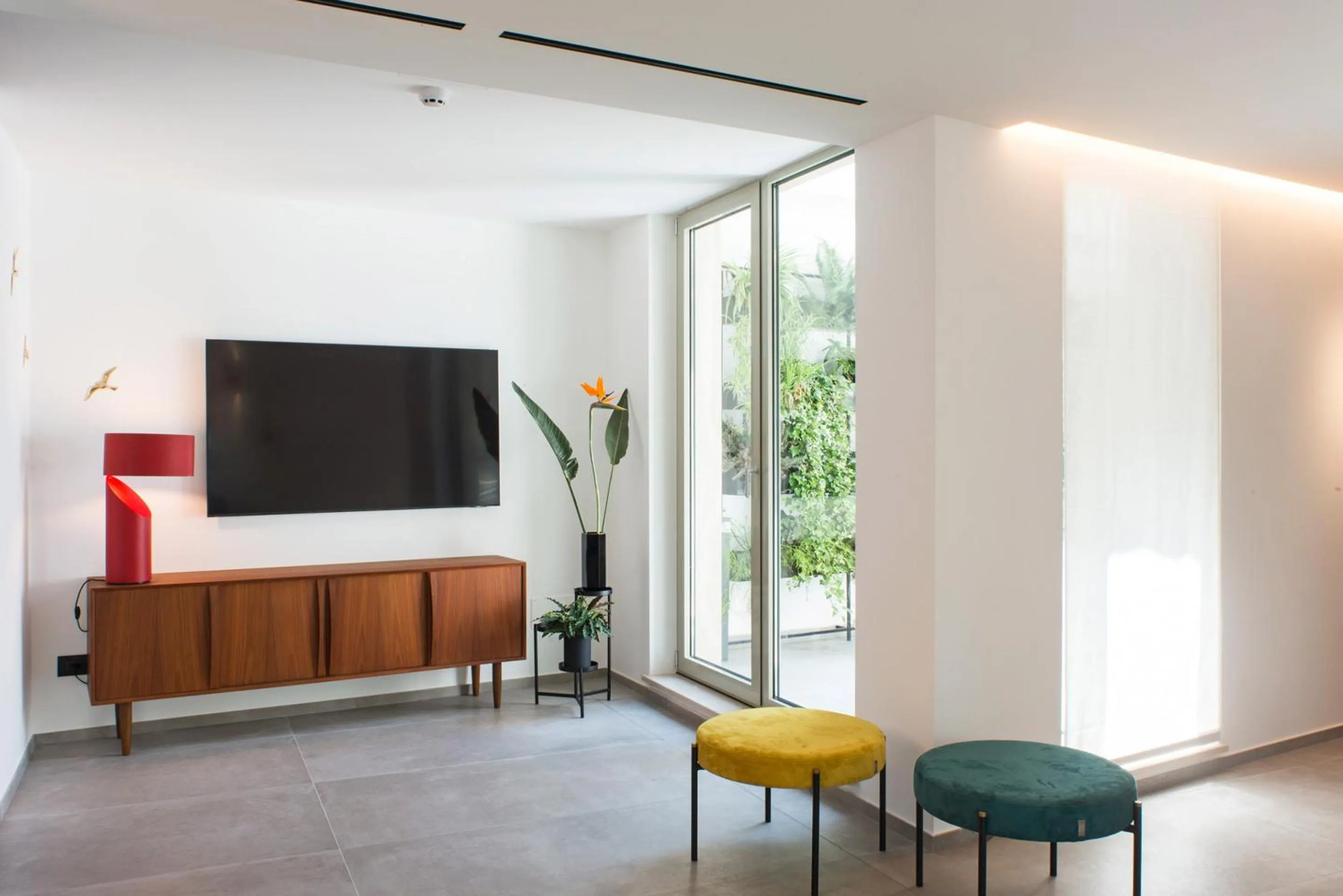 Communal lounge/ TV room in Spazio Gagarin Residence