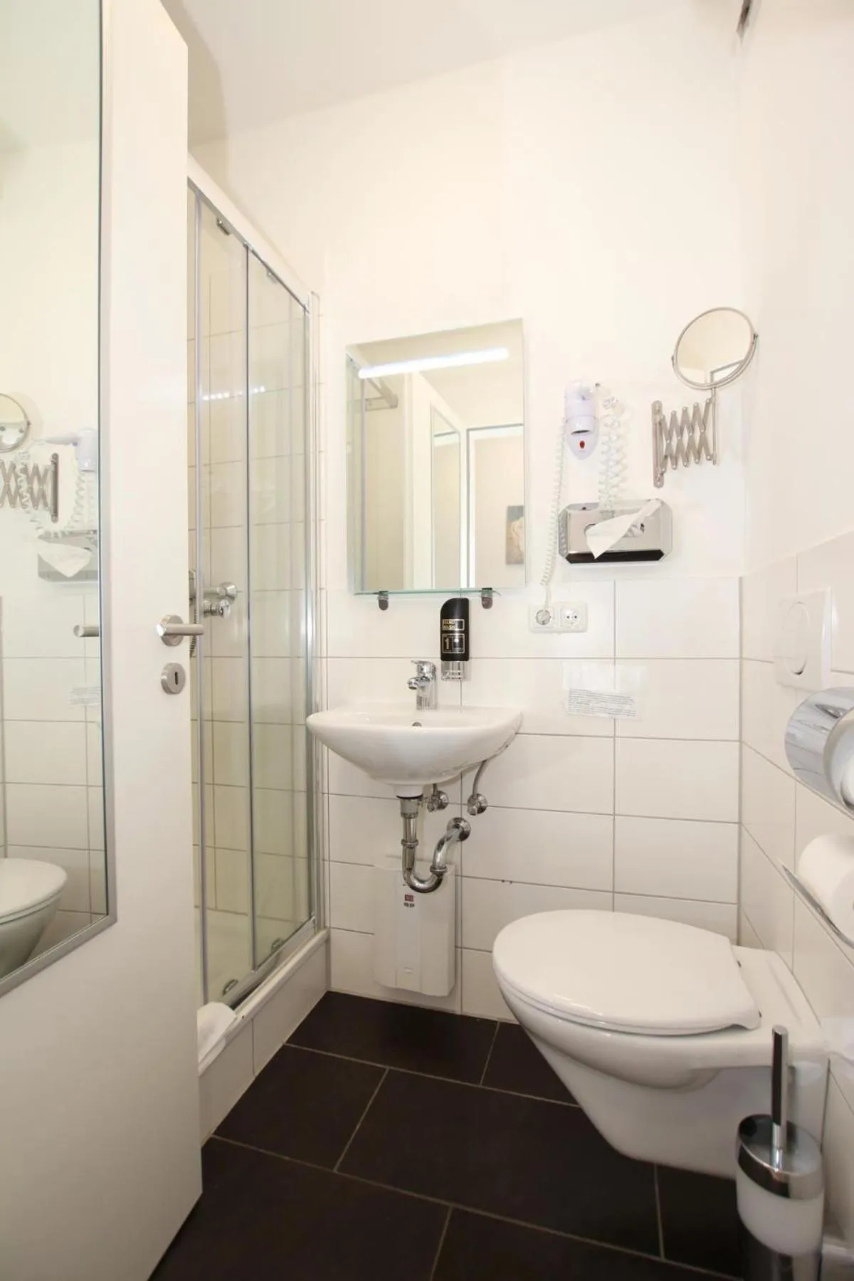 Bathroom in Apartment Hotel am Sand