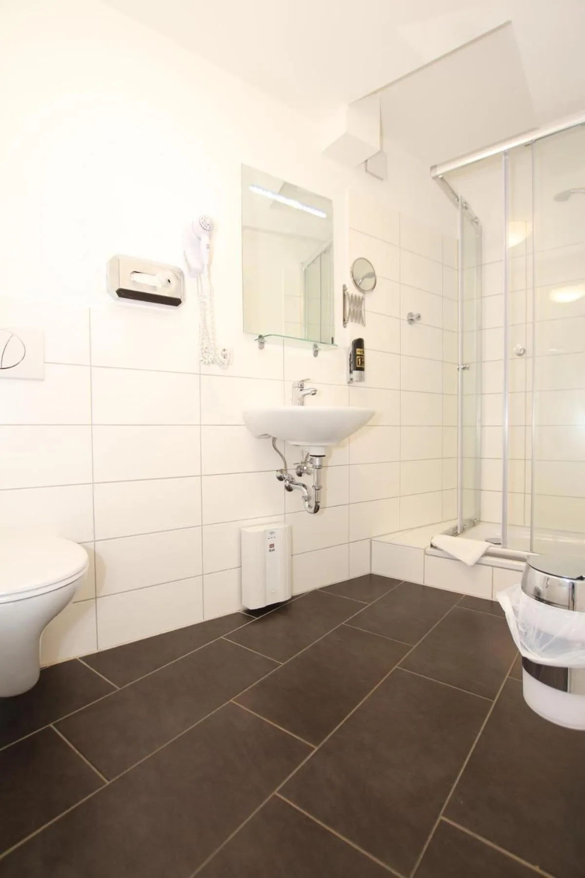 Bathroom in Apartment Hotel am Sand