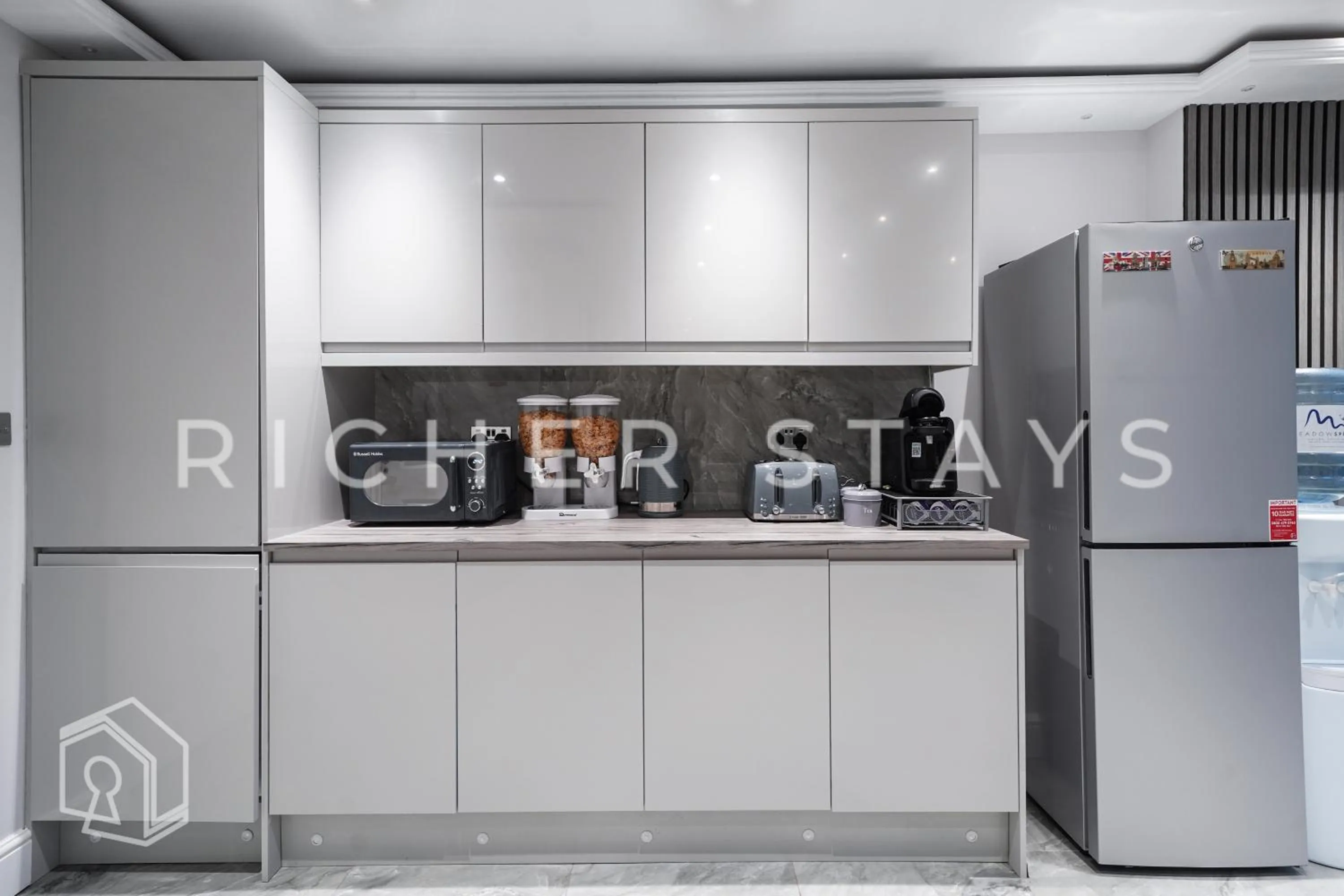 Property logo or sign in Hackney Suites - En-suite rooms & amenities