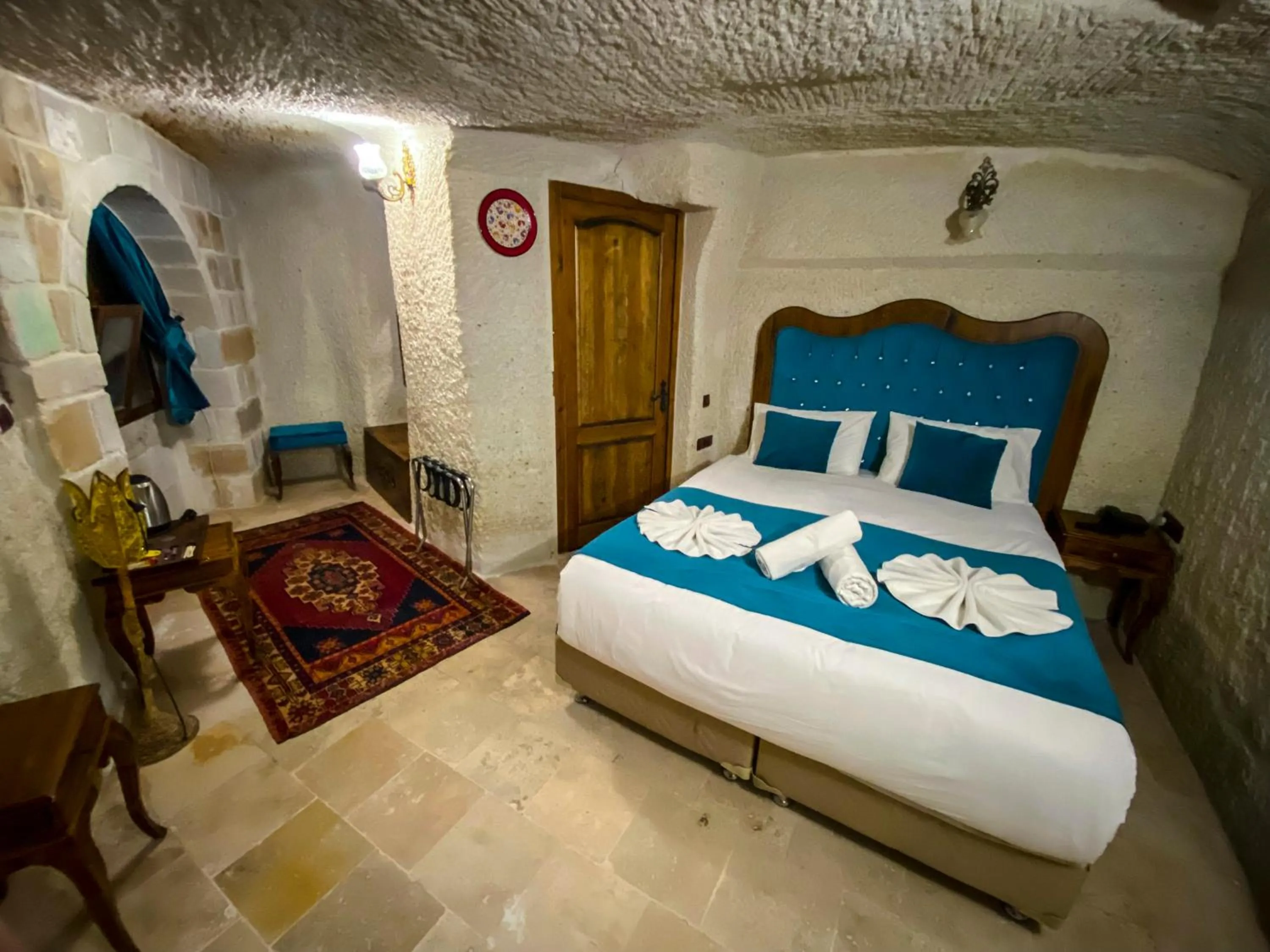 Bed in Milagre Cave Hotel
