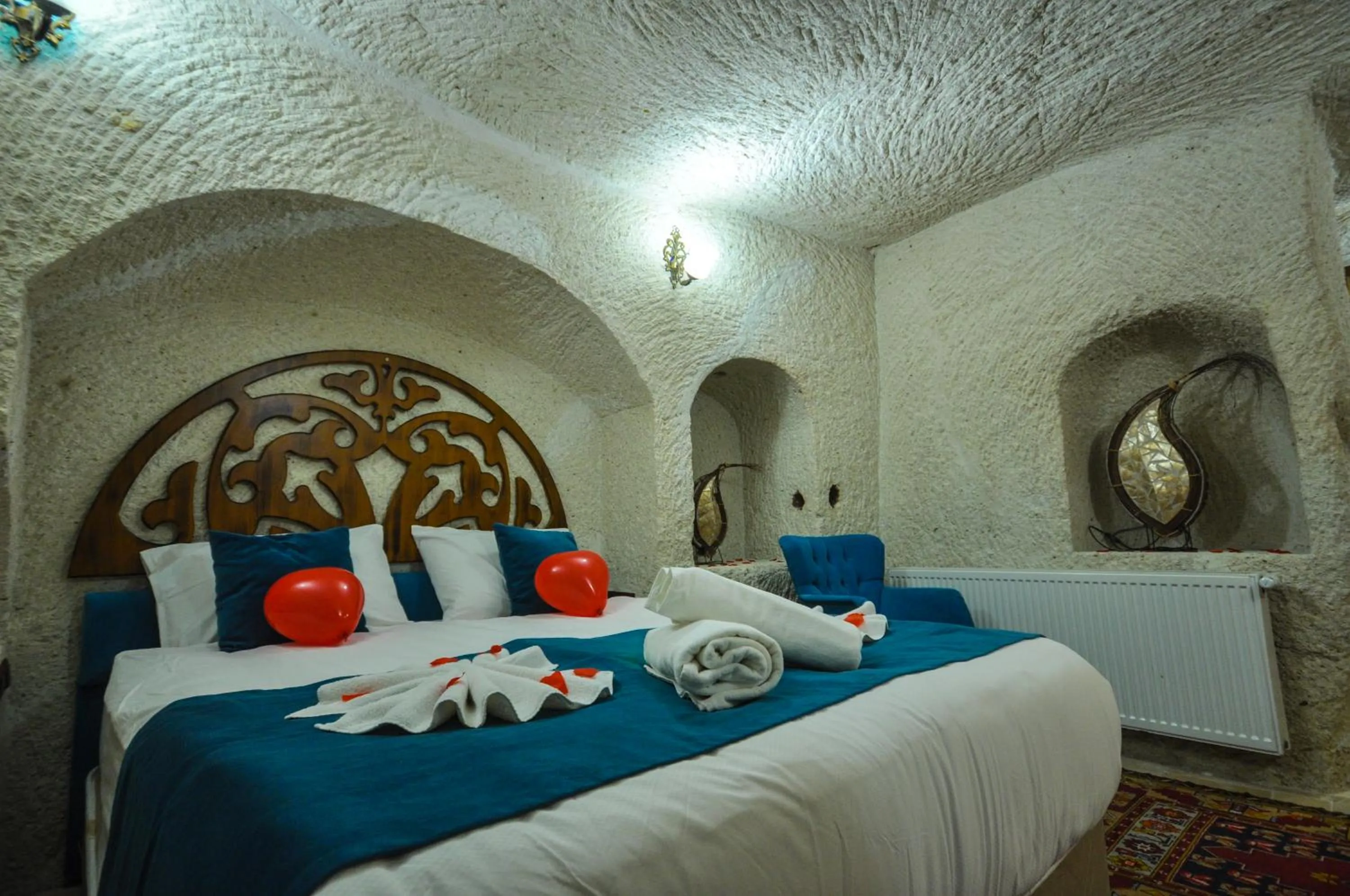 Bed in Milagre Cave Hotel