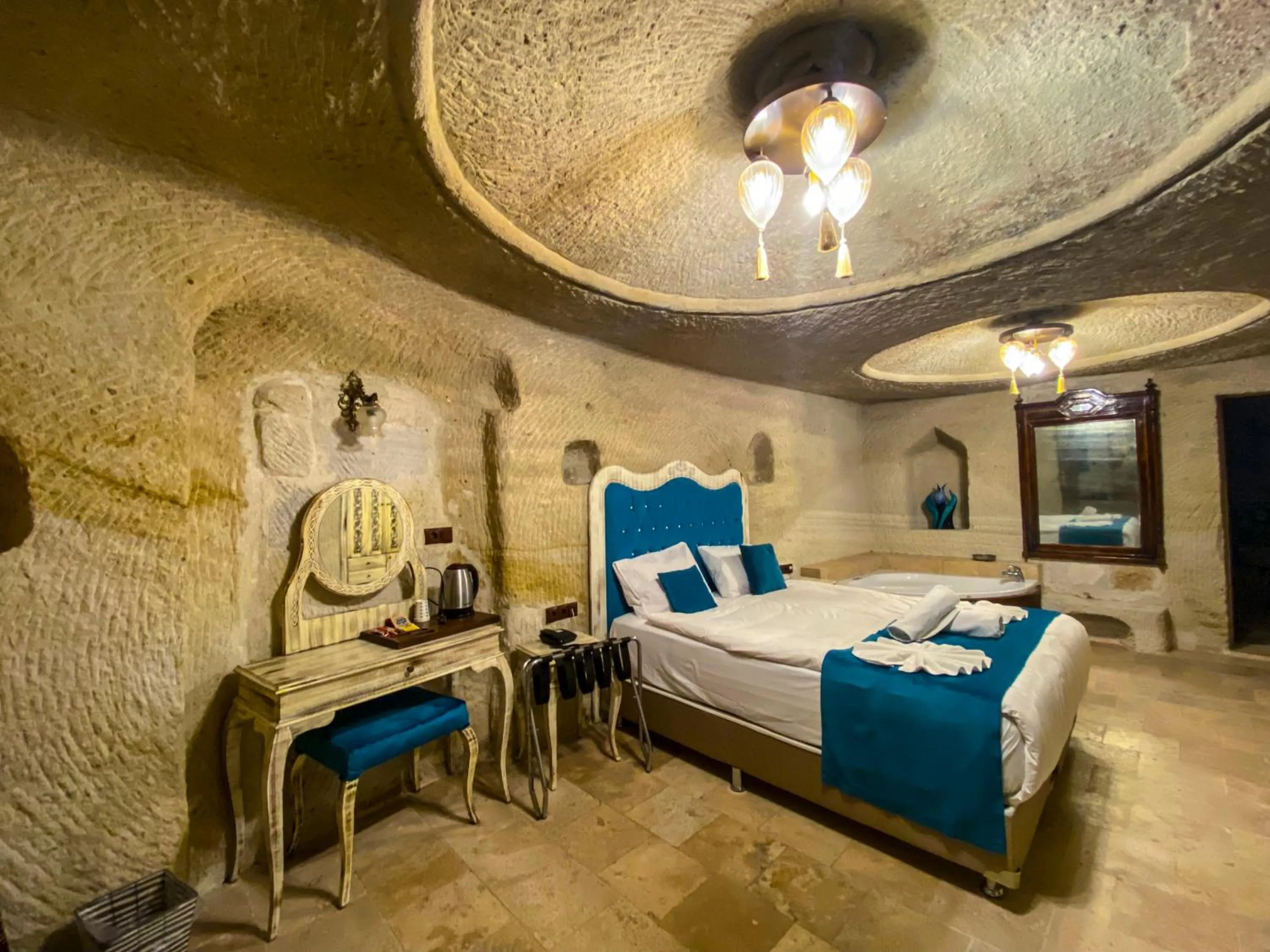 Bed in Milagre Cave Hotel
