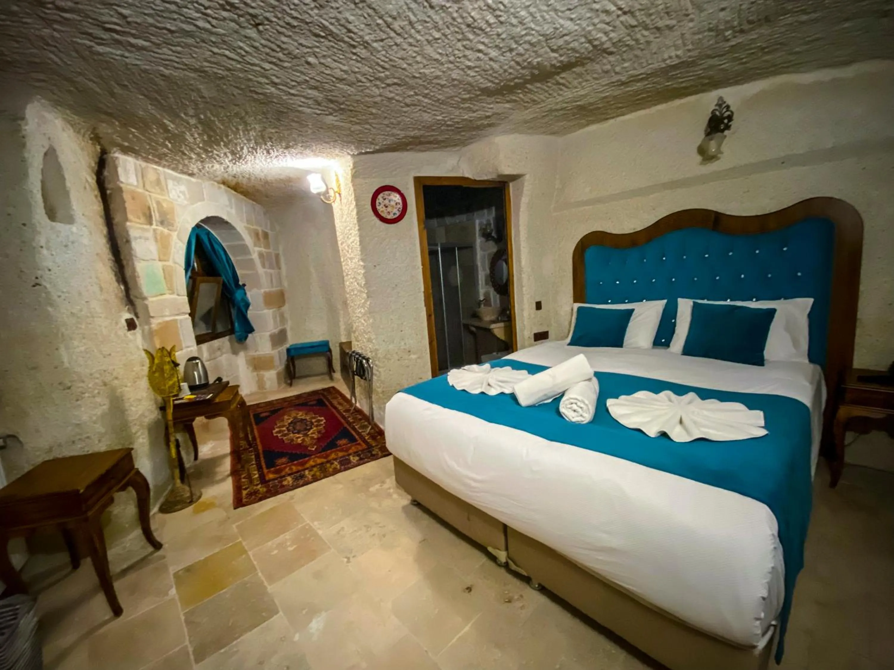 Bed in Milagre Cave Hotel