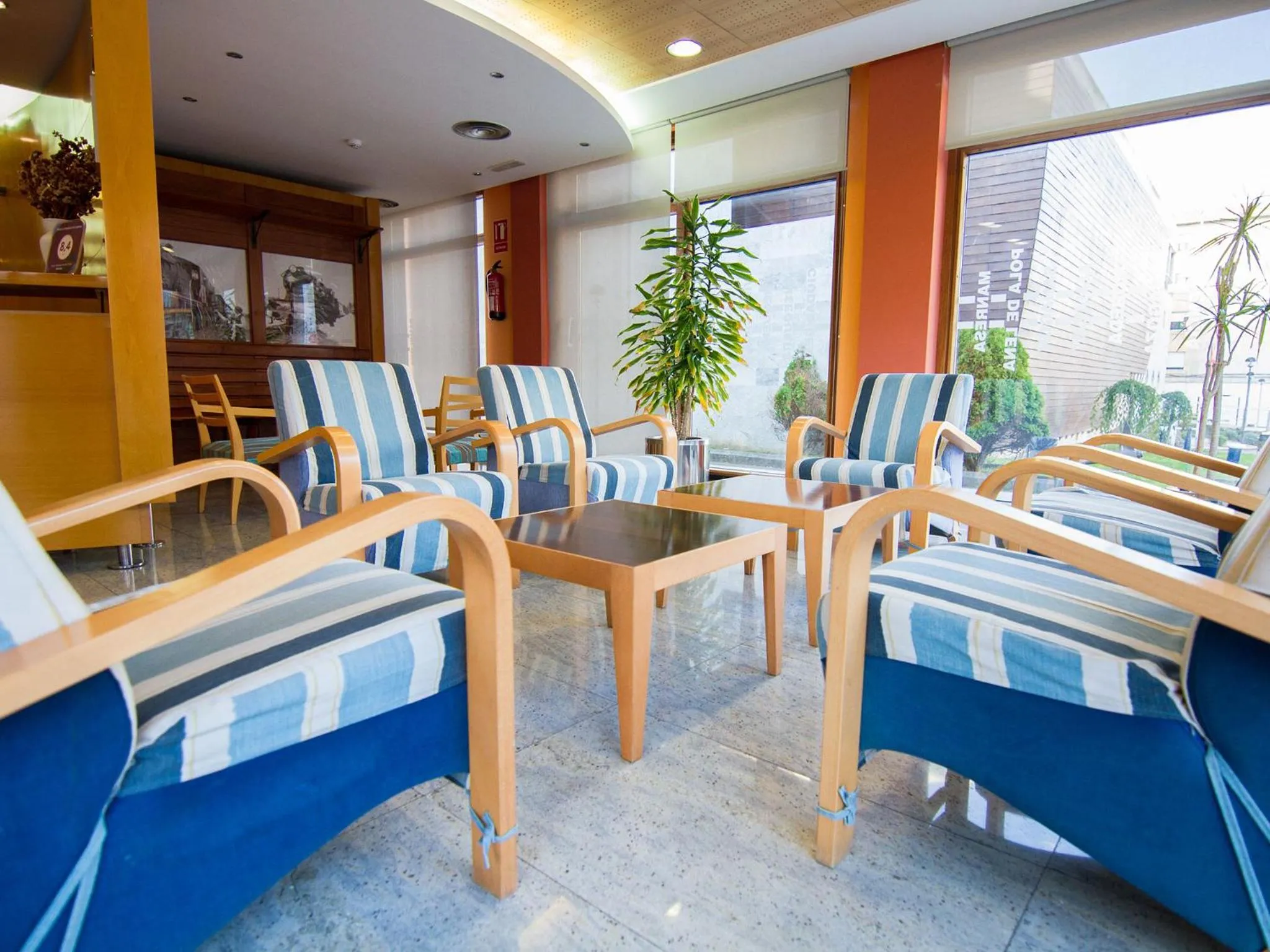 Communal lounge/ TV room in Hotel La Estación de Luanco