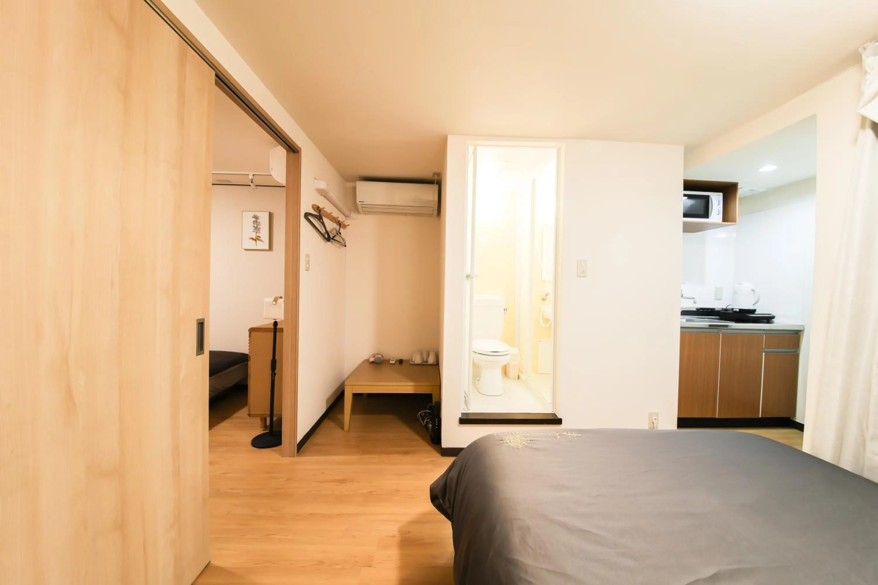 Bedroom, Bed in Sakuranomiya Hotel-Self Service