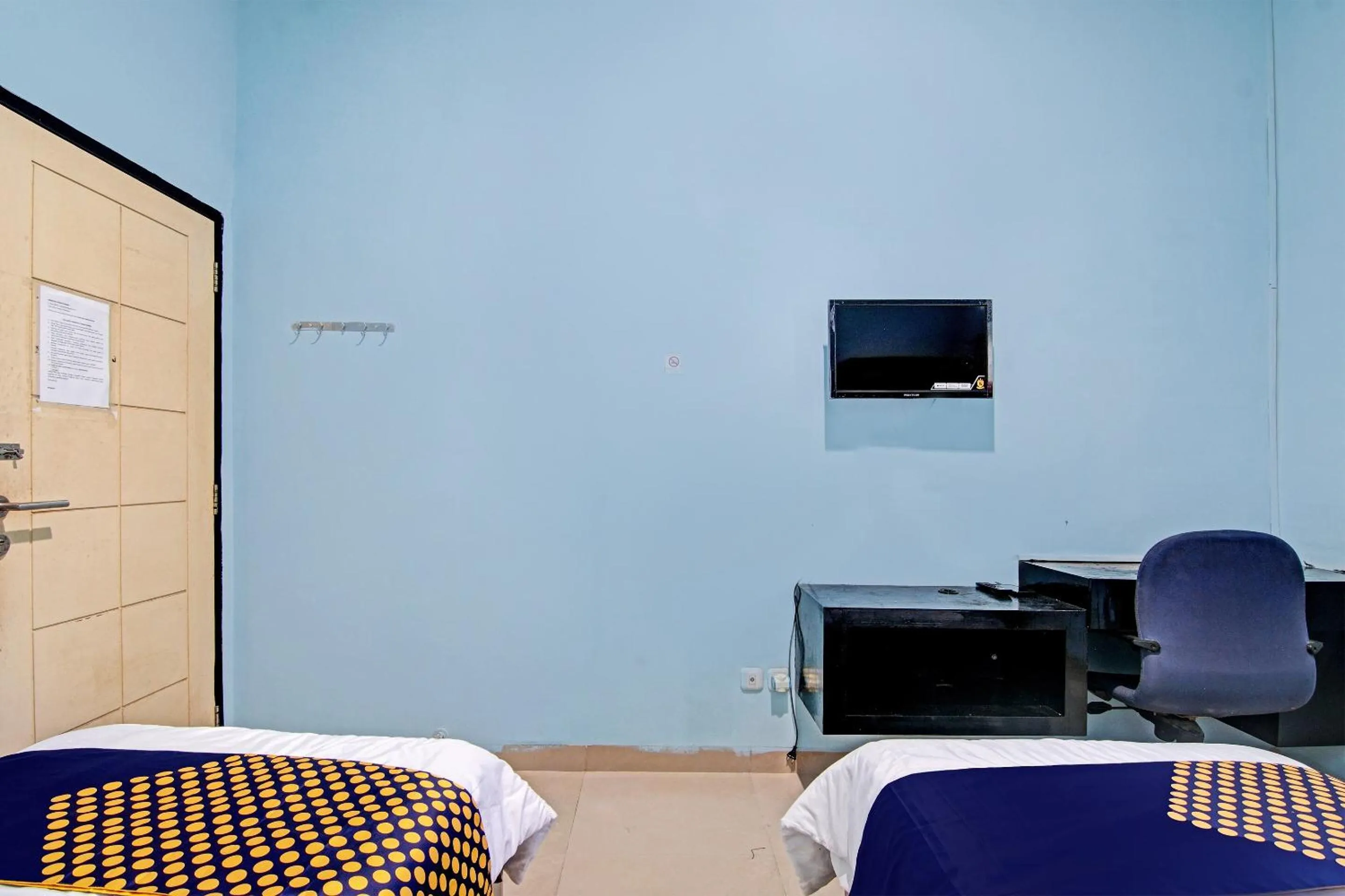 Bedroom, Bed in Hotel O Penginapan Puti SyariahNearBandara Sultan Syarif Kasim II