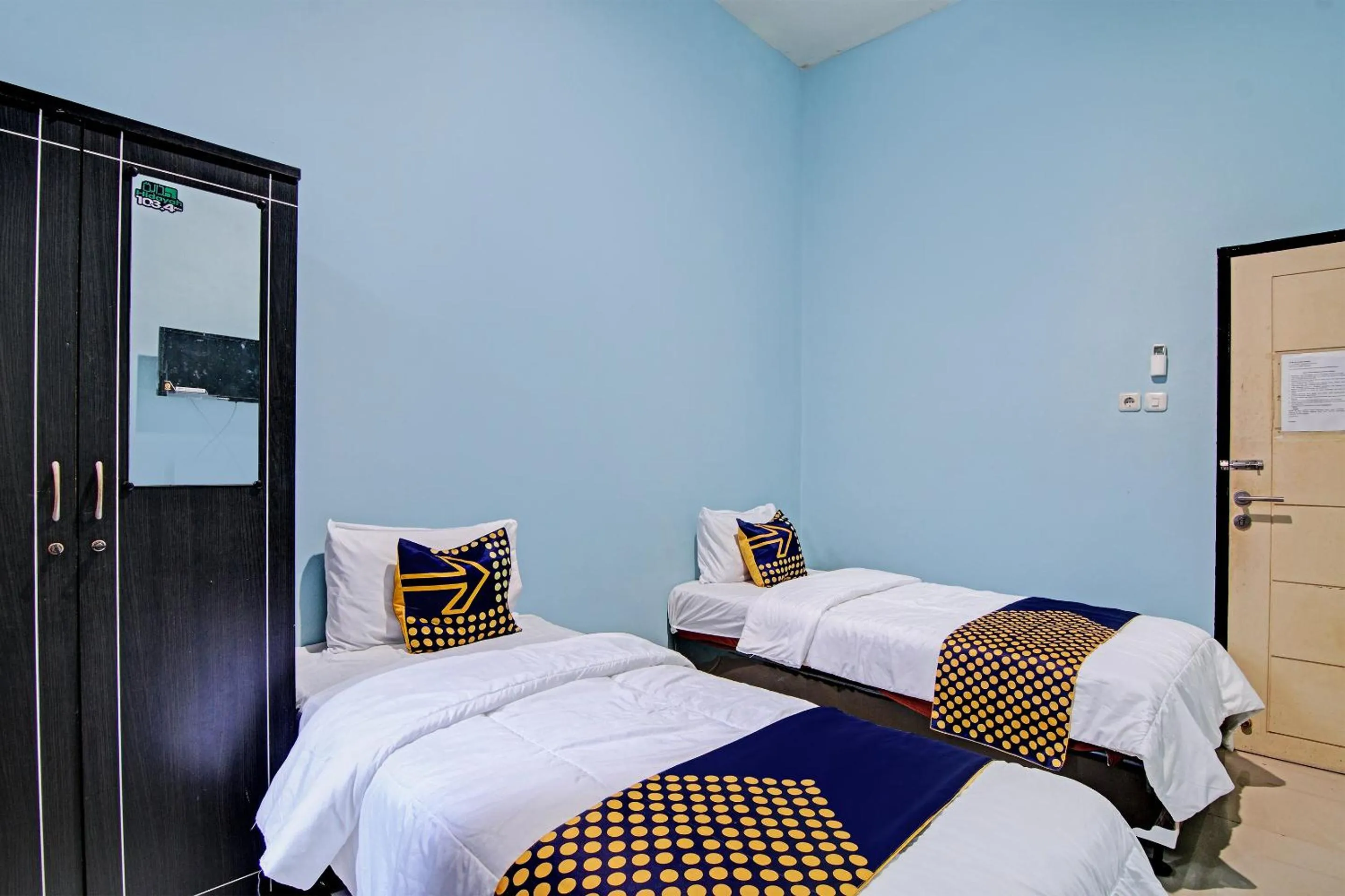 Bedroom, Bed in Hotel O Penginapan Puti SyariahNearBandara Sultan Syarif Kasim II